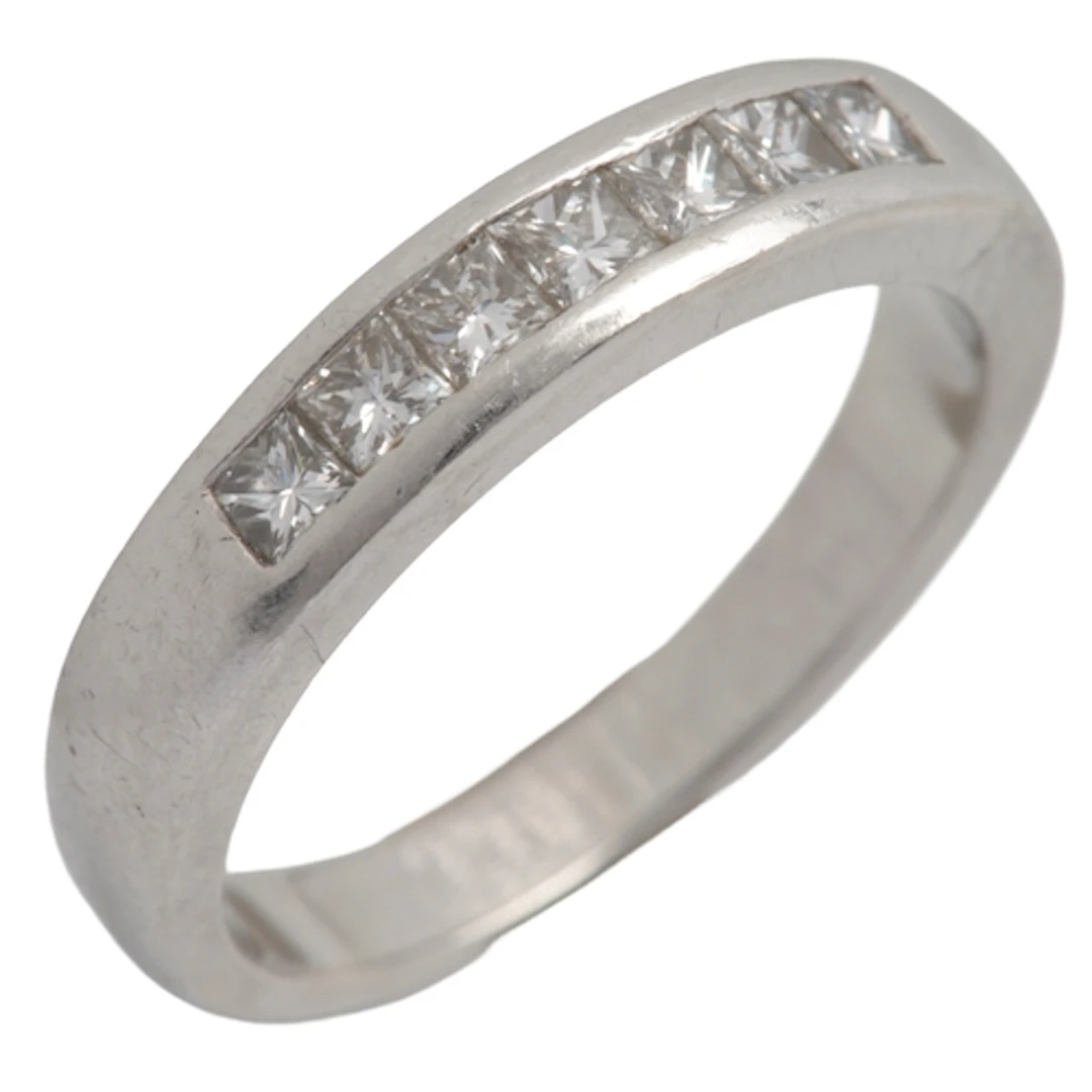 A diamond half hoop ring, channel-set with princess-cut diam...