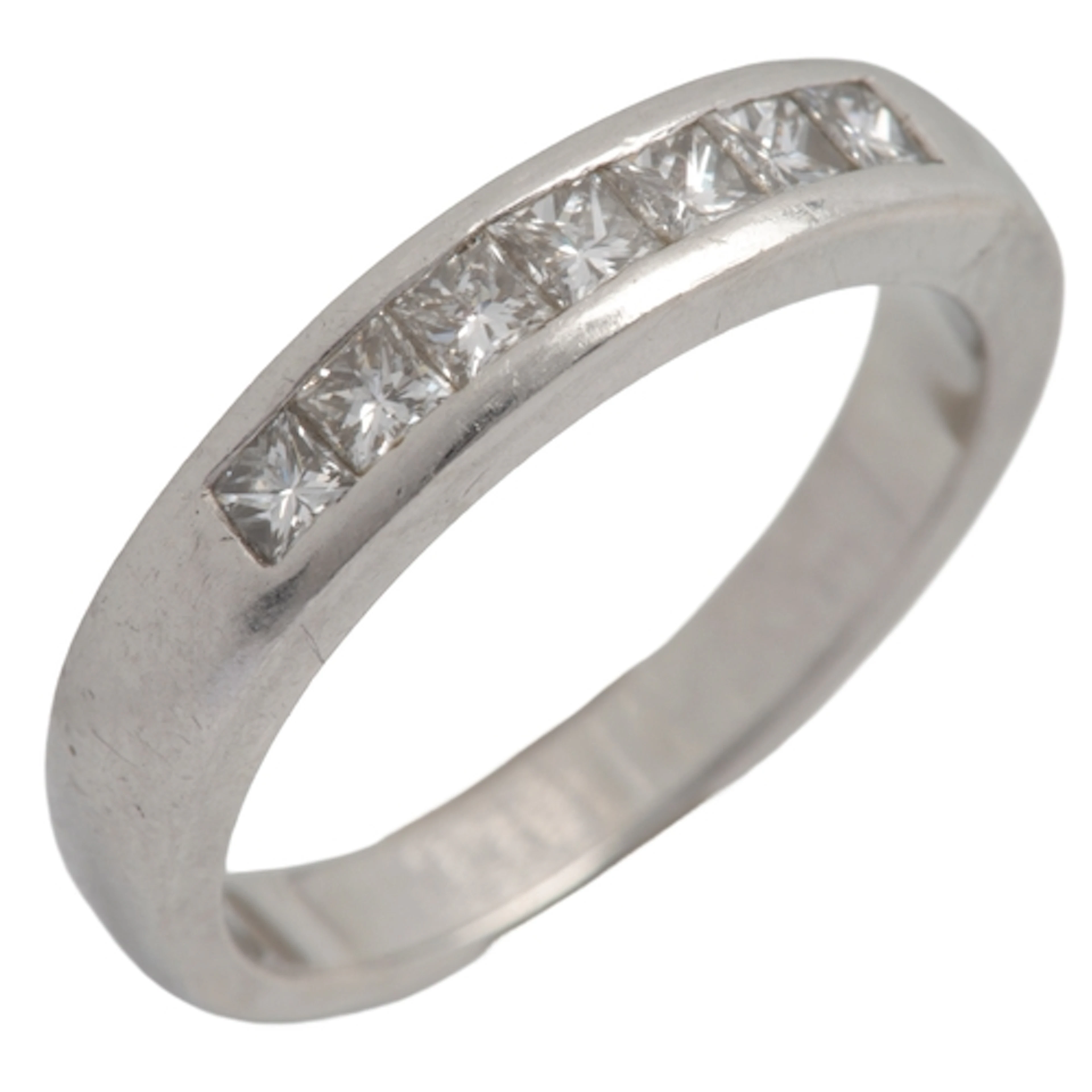 A diamond half hoop ring, channel-set with princess-cut diam...