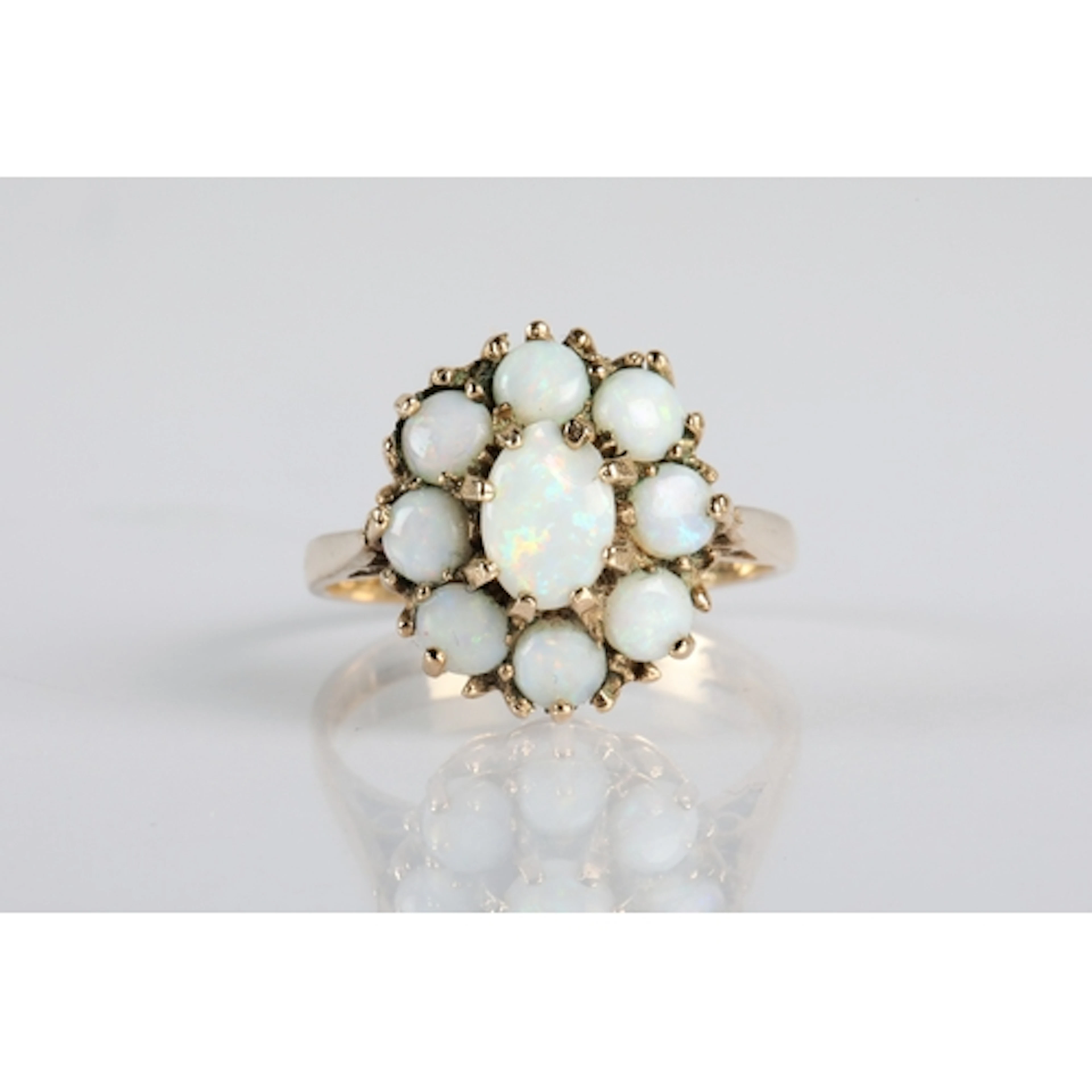 Ladies 9ct gold opal cluster ring central opal (slightly dam...