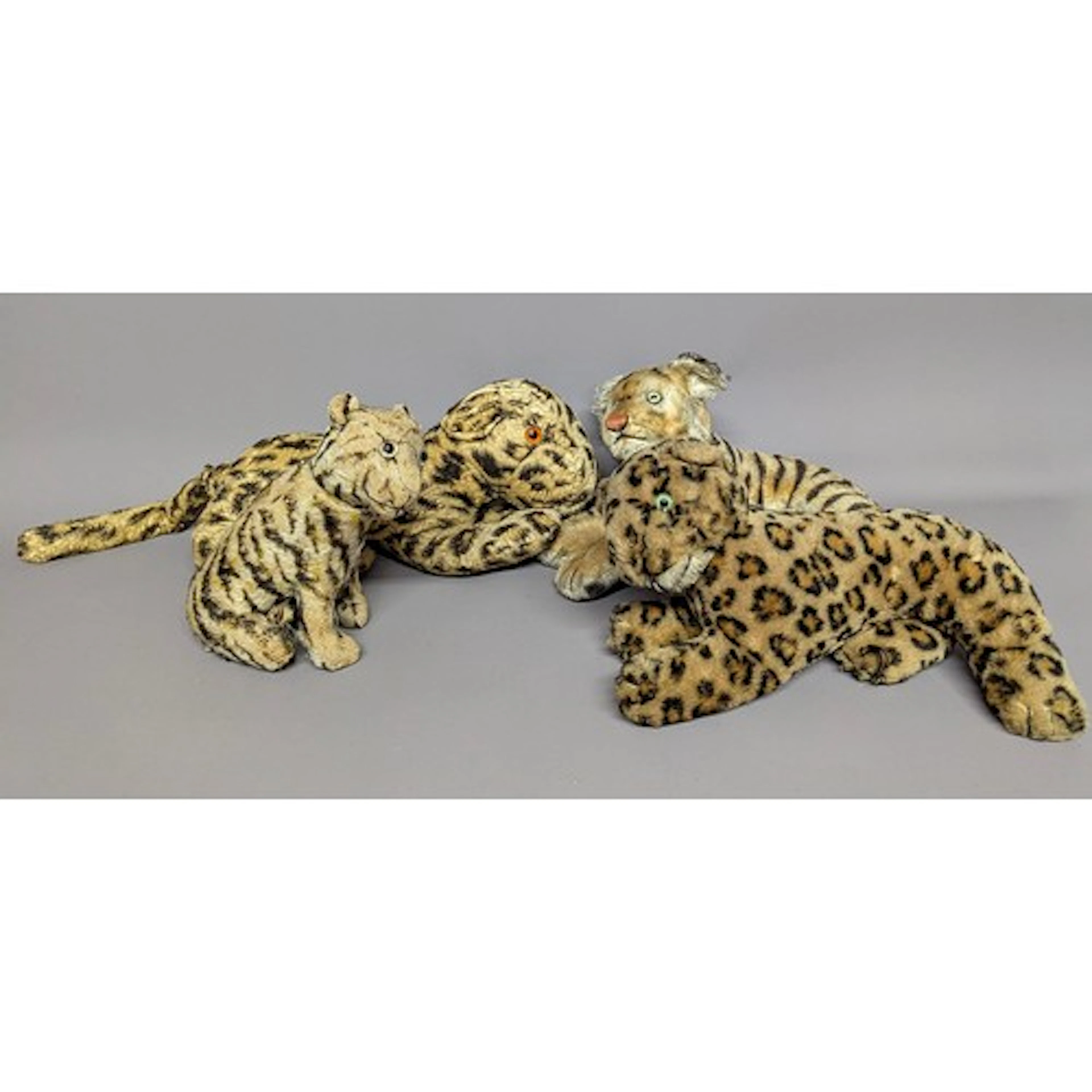 Toys & Dolls - an early 20th century German plush seated tig...