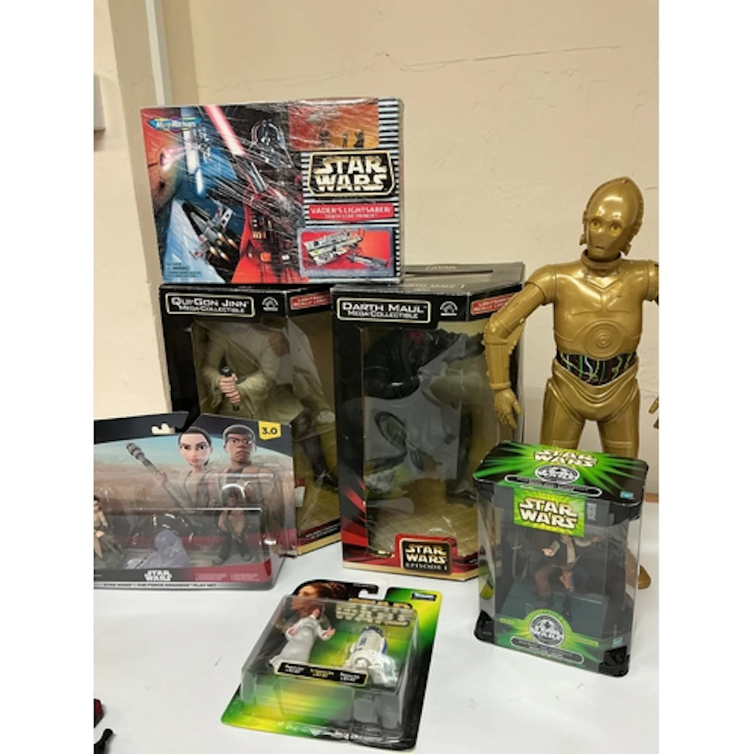 2 Boxes Containing Star Wars Collectables.
