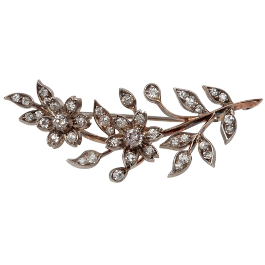 A Victorian diamond brooch, late 19th century, designed as a...
