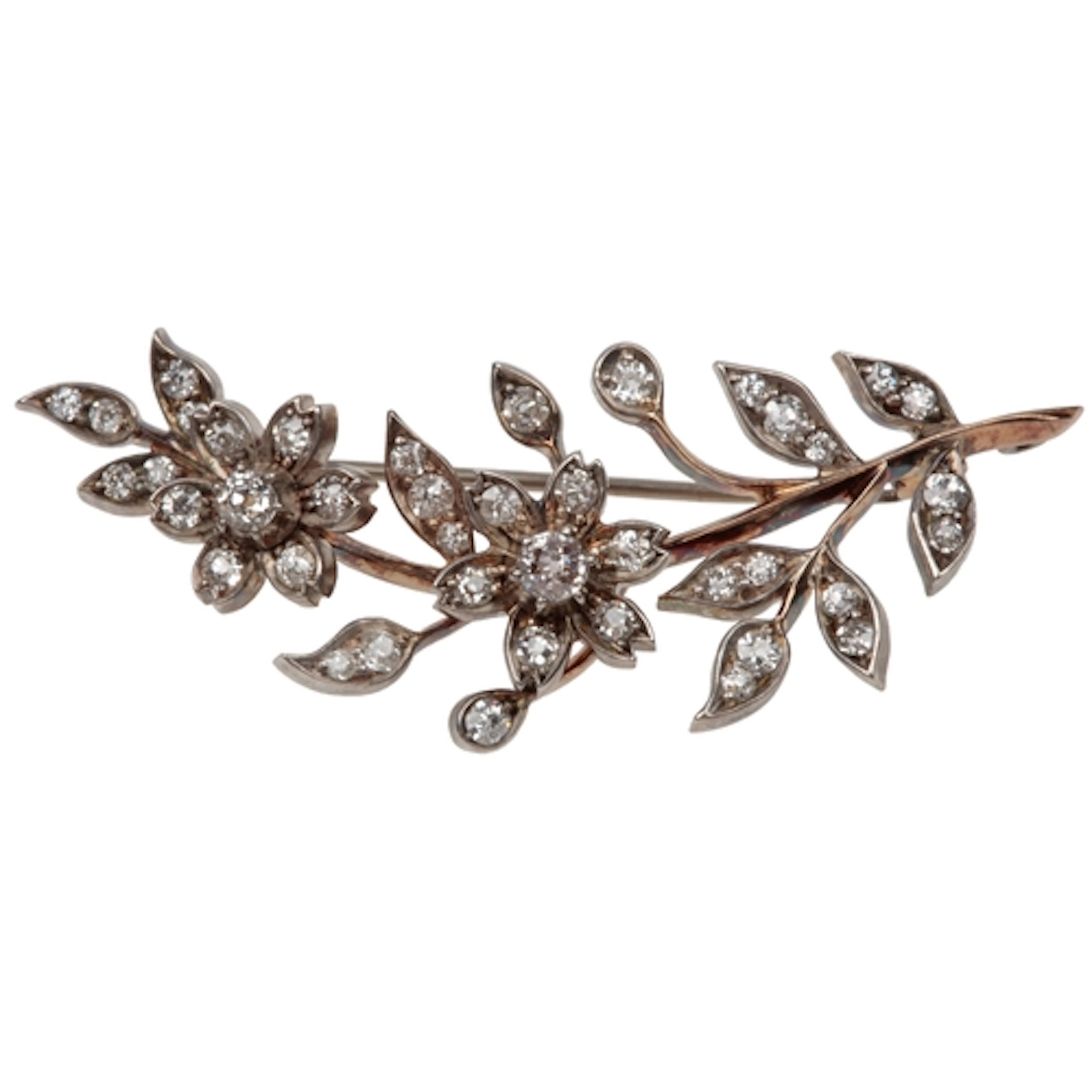 A Victorian diamond brooch, late 19th century, designed as a...