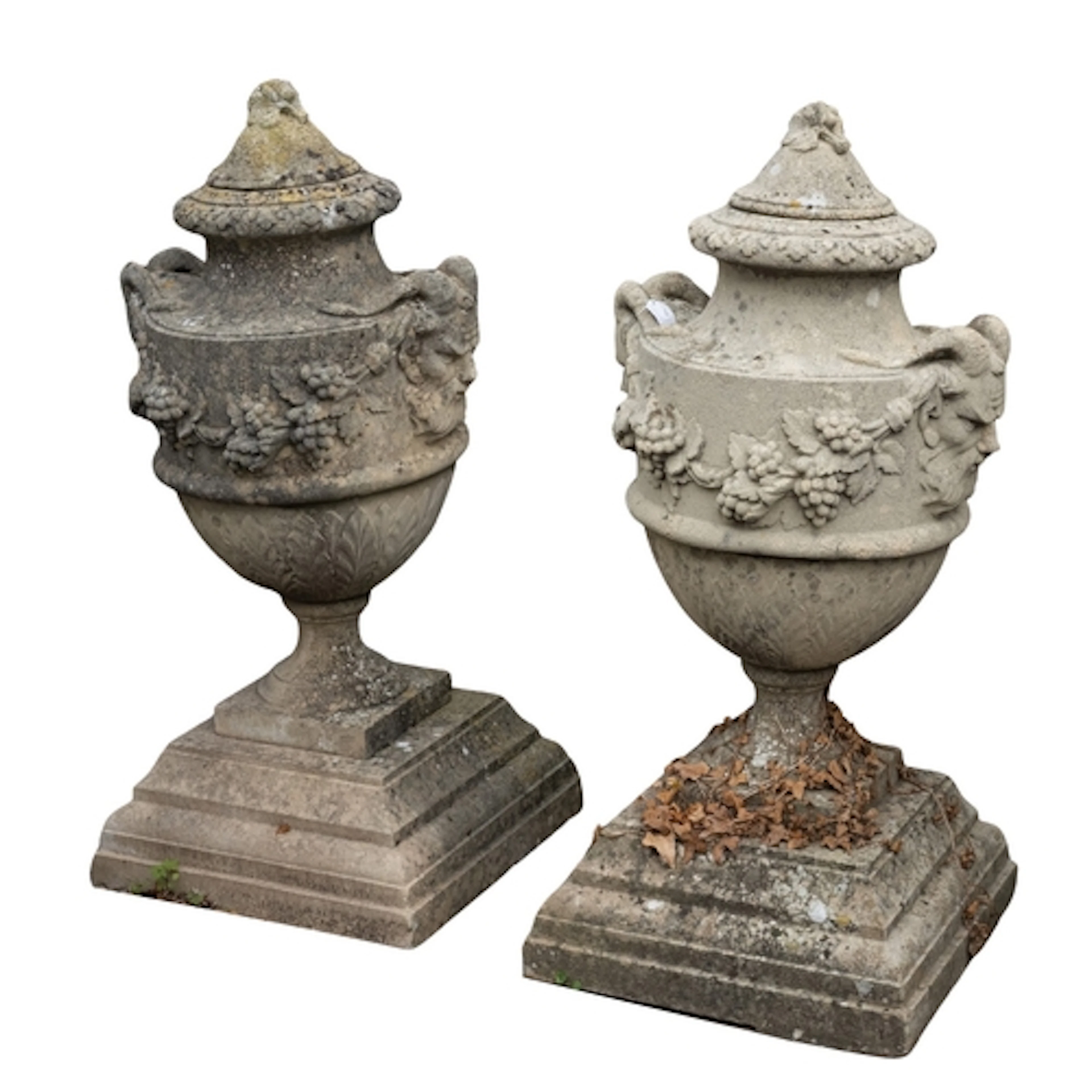 A set of four stone composition garden urns, 20th century; e...