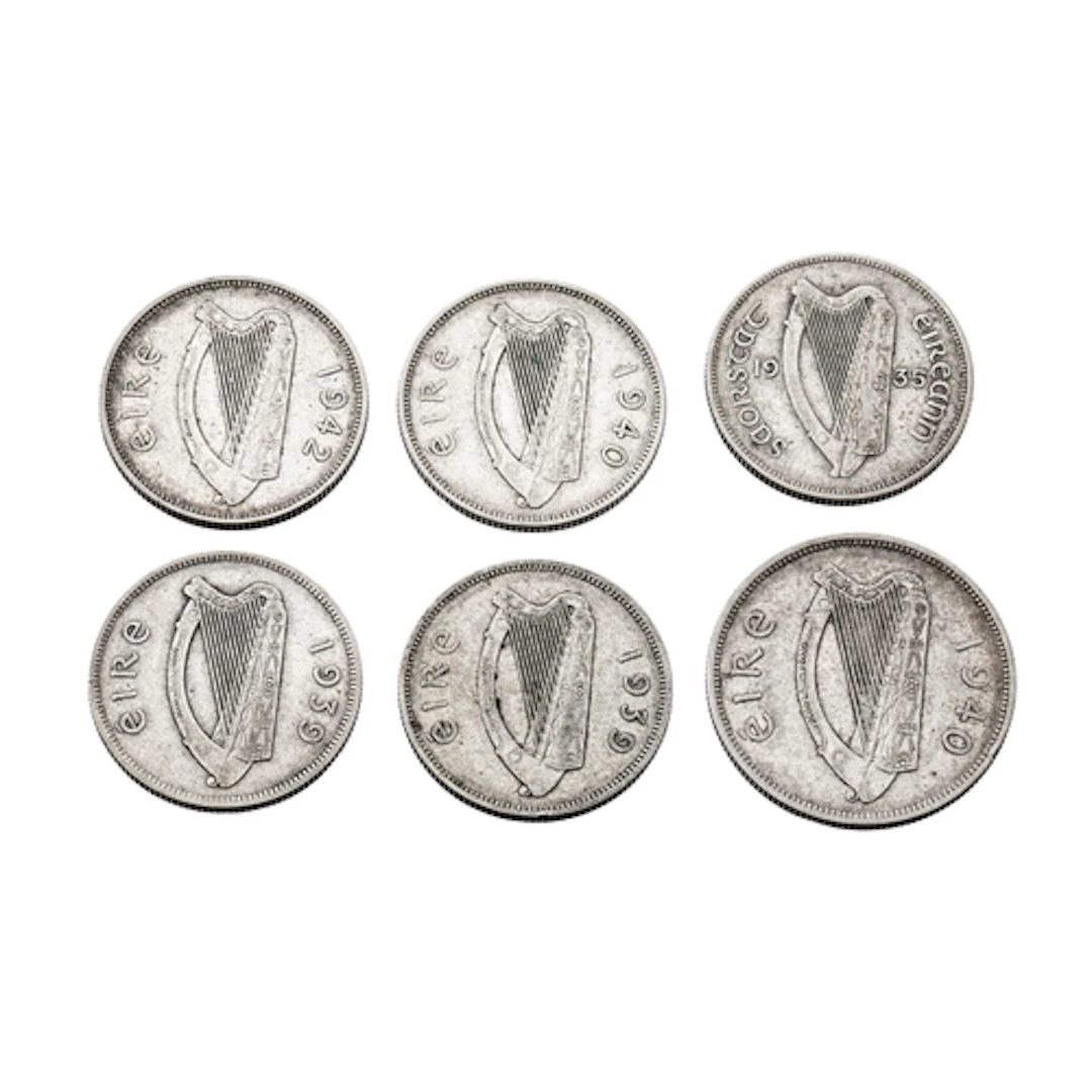 A 1940 IRISH SILVER HALF CROWN COIN, plus 6 x 1935 - 1942 Fl...