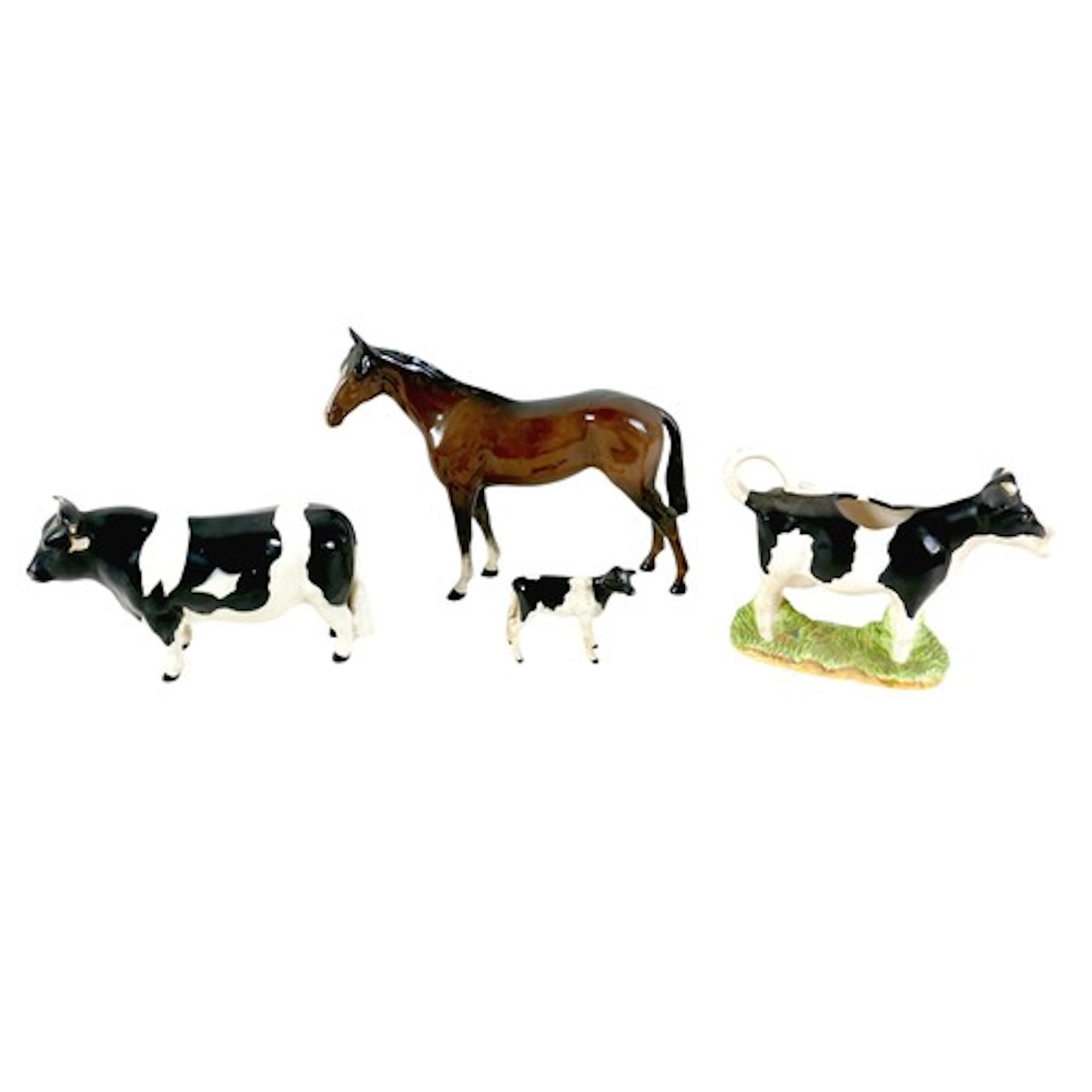 A group of three Beswick animal figures, comprising a bull '...