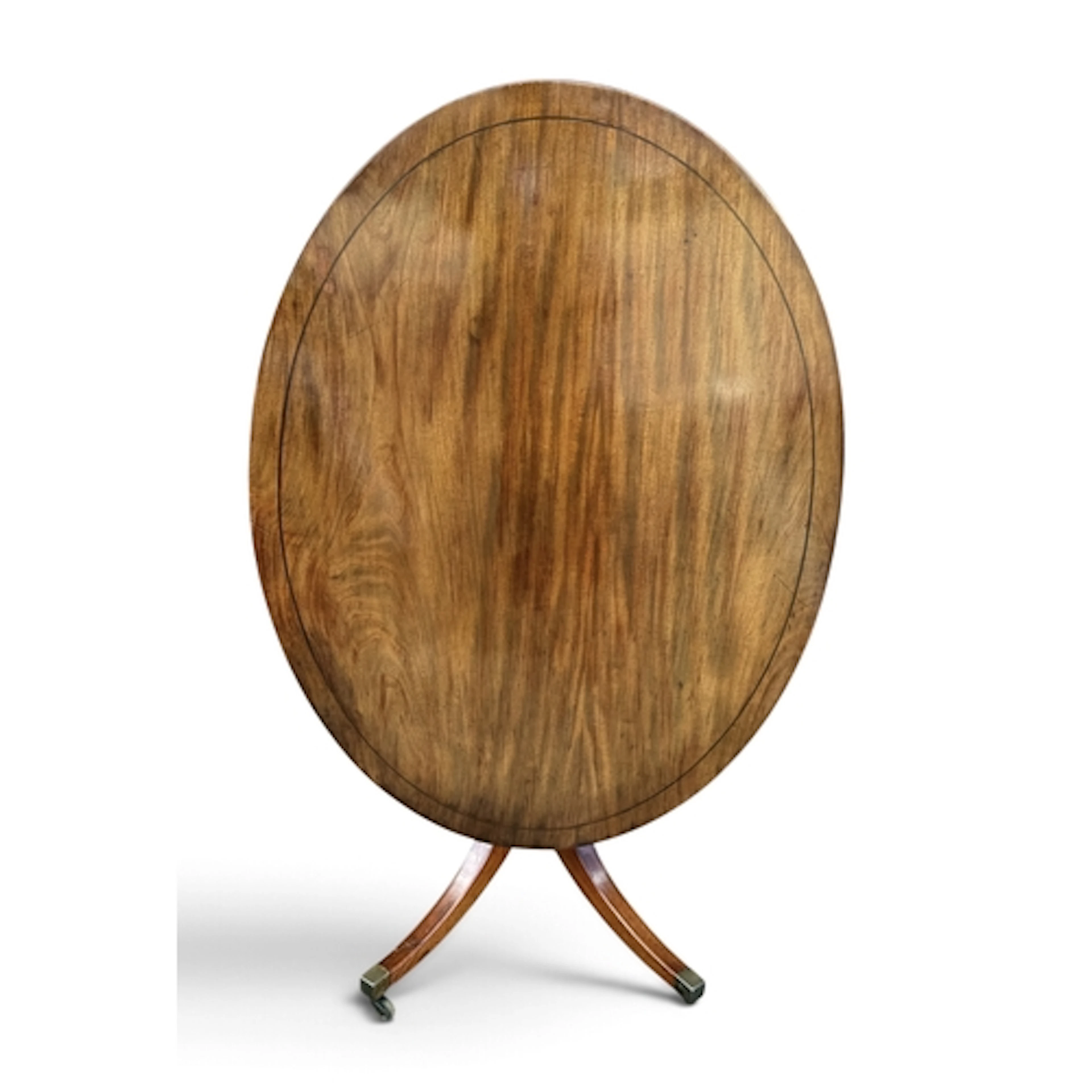AN EARLY 19TH CENTURY MAHOGANY OVAL TILT TOP PEDESTAL DINING...