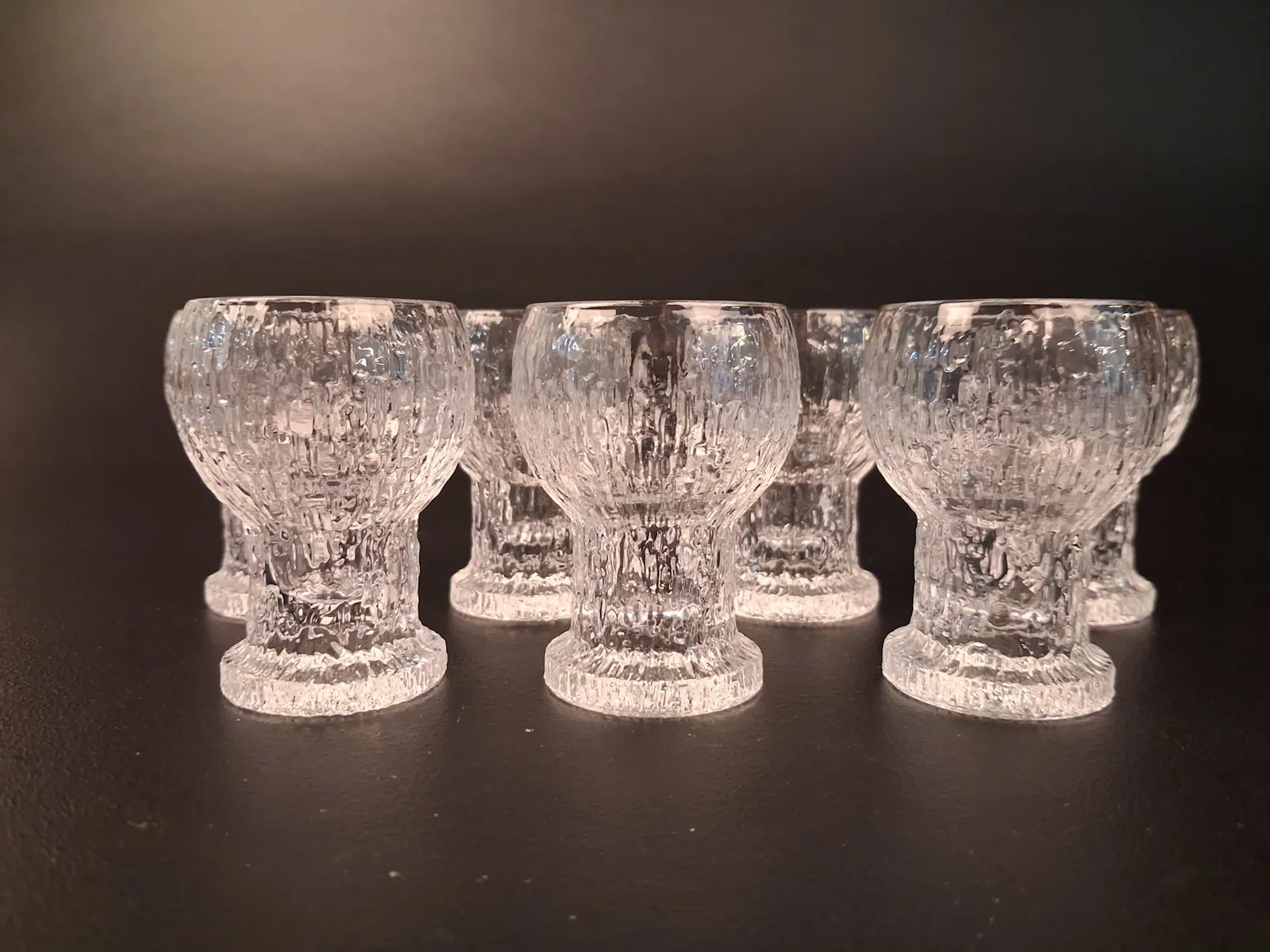 TIMO SARPANEVA. 7 Snapsglas, "Kekkerit", Iittala.