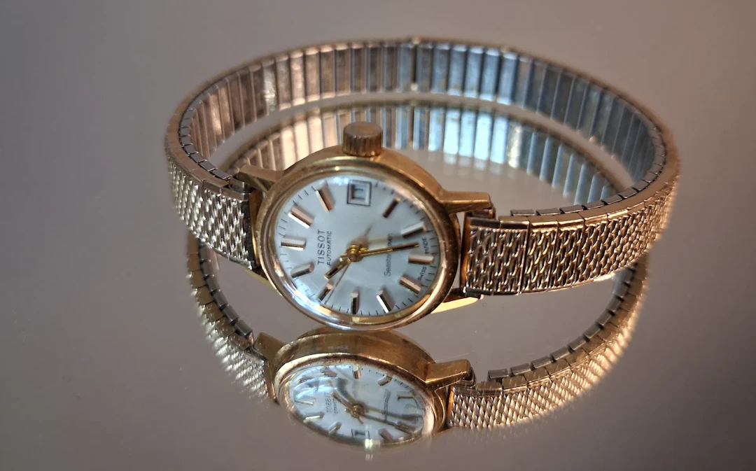 Damur. 18K Guld, Trissot Automatic, Seven Seastar.