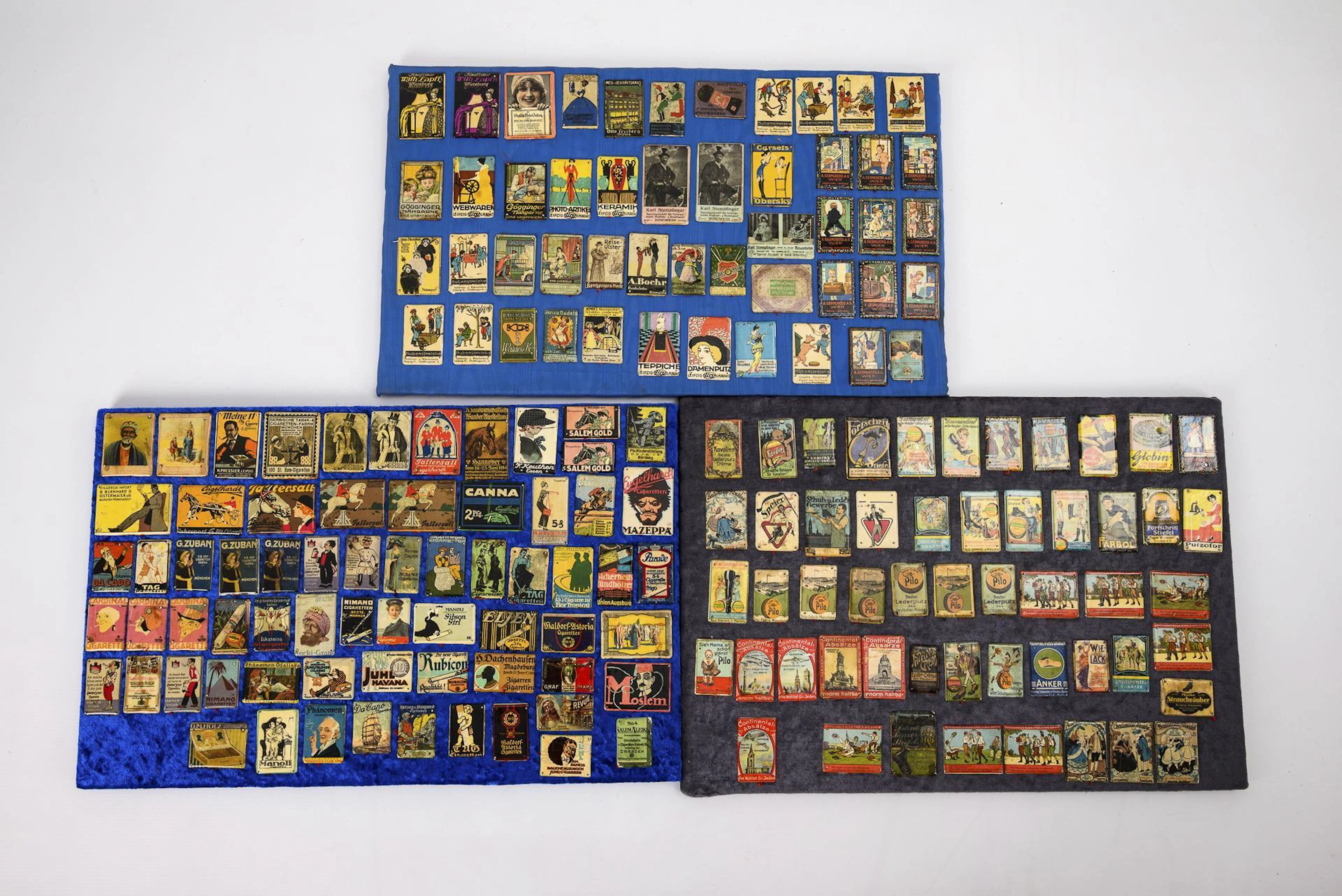 3 plates with a total of approx. 70 miniature advertising plaques.