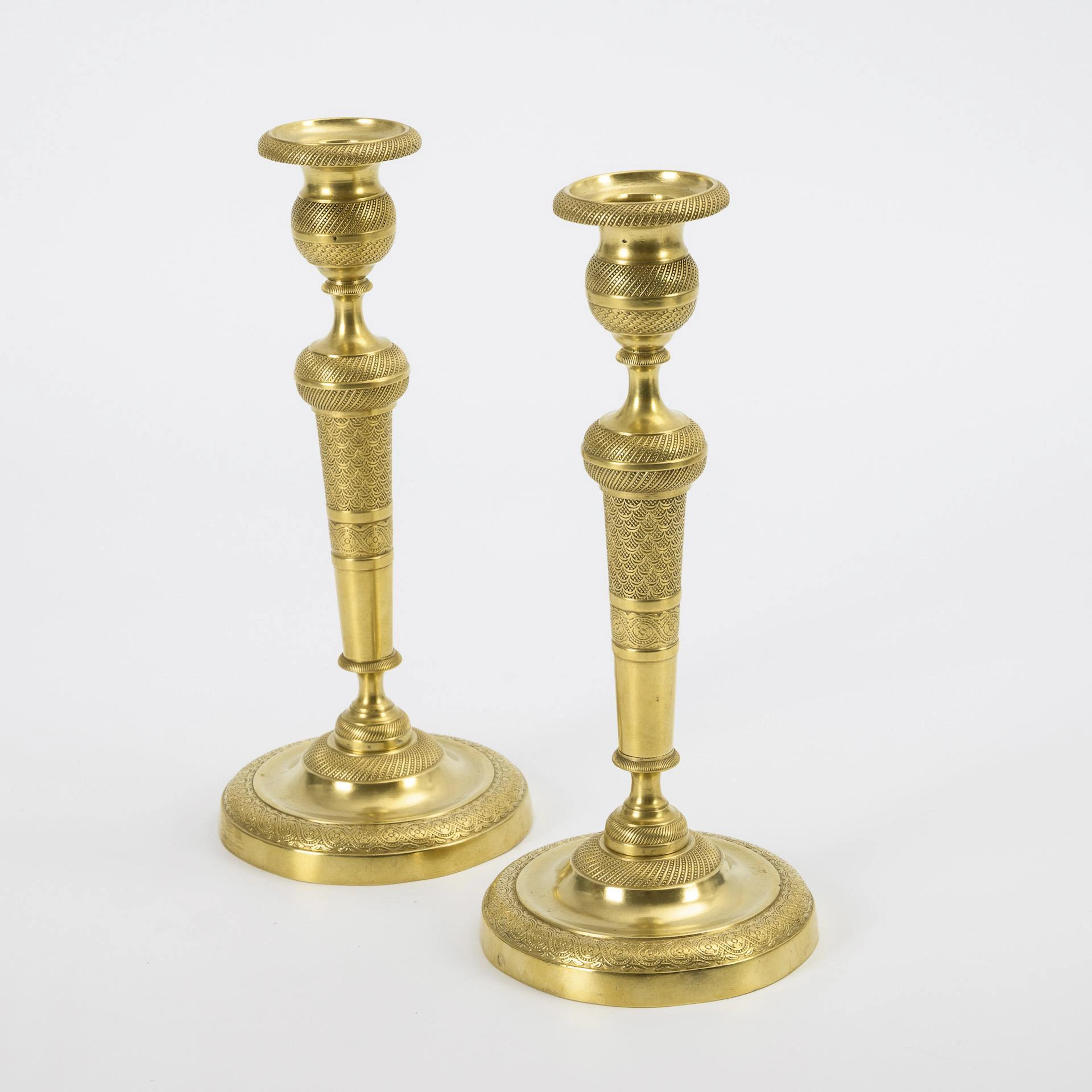 Pair of French bronze candlesticks.