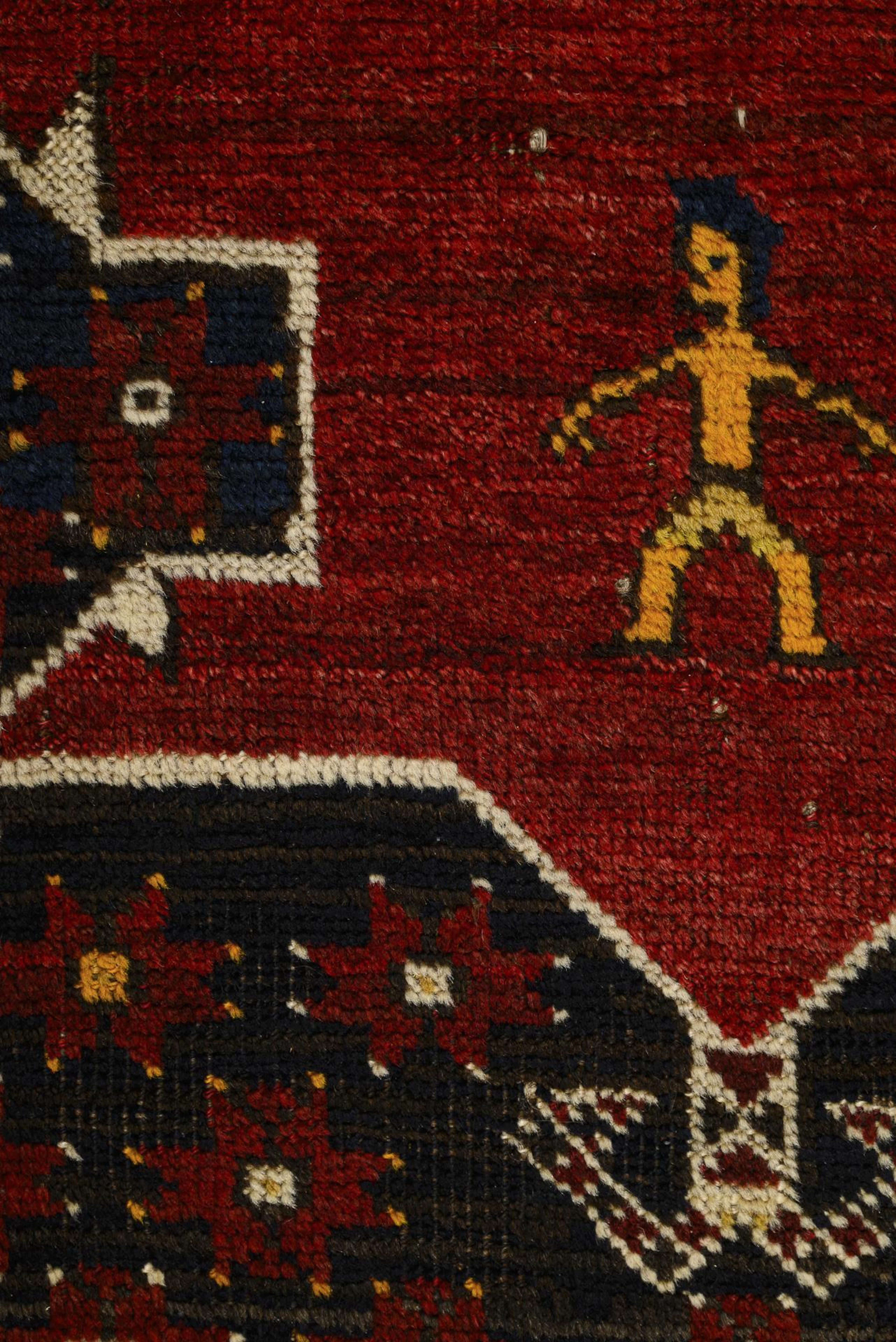 Beluch prayer rug with stylized figure.
