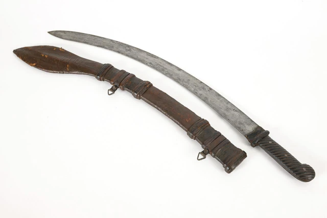 African saber with leather sheath.