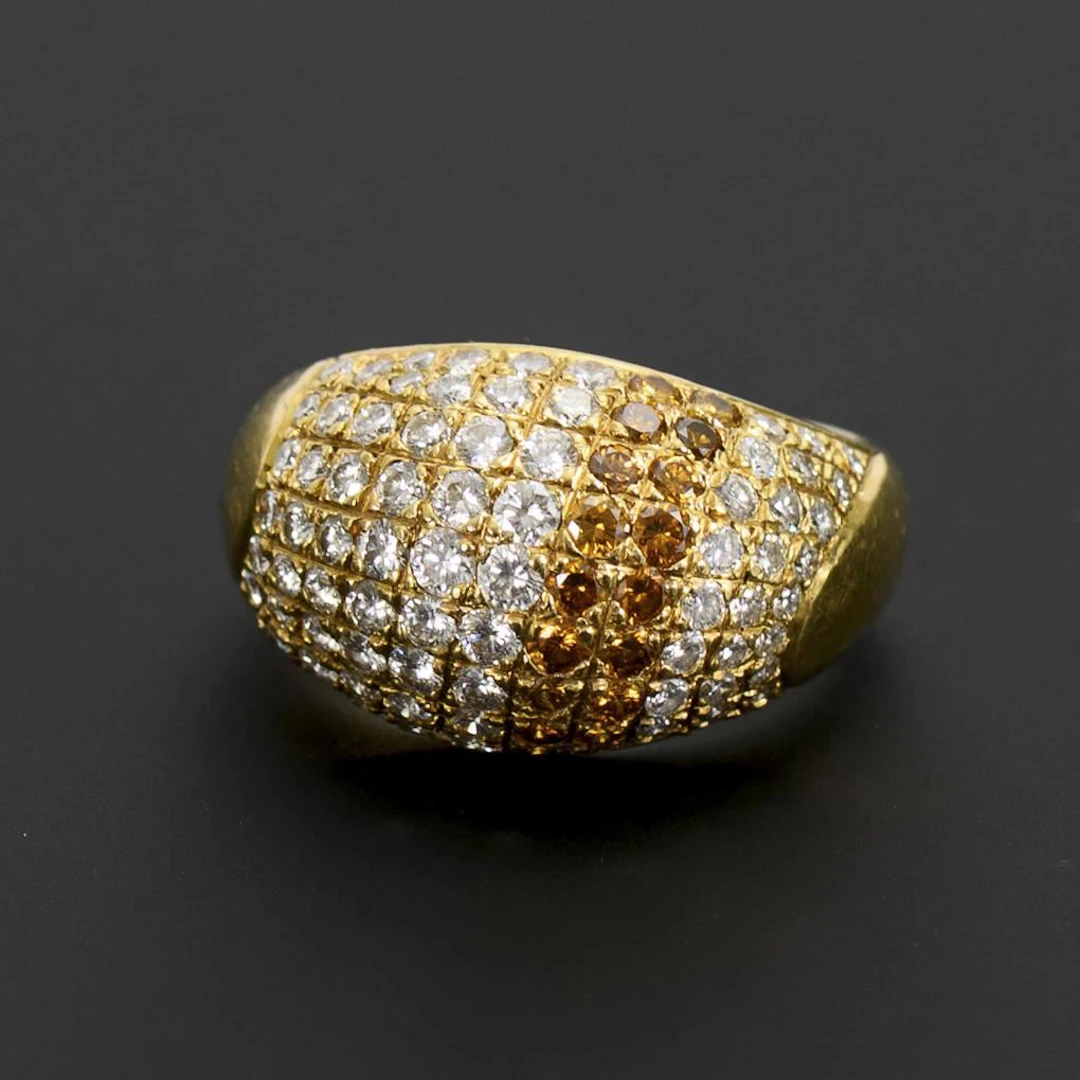 Ring with two-tone diamond setting.