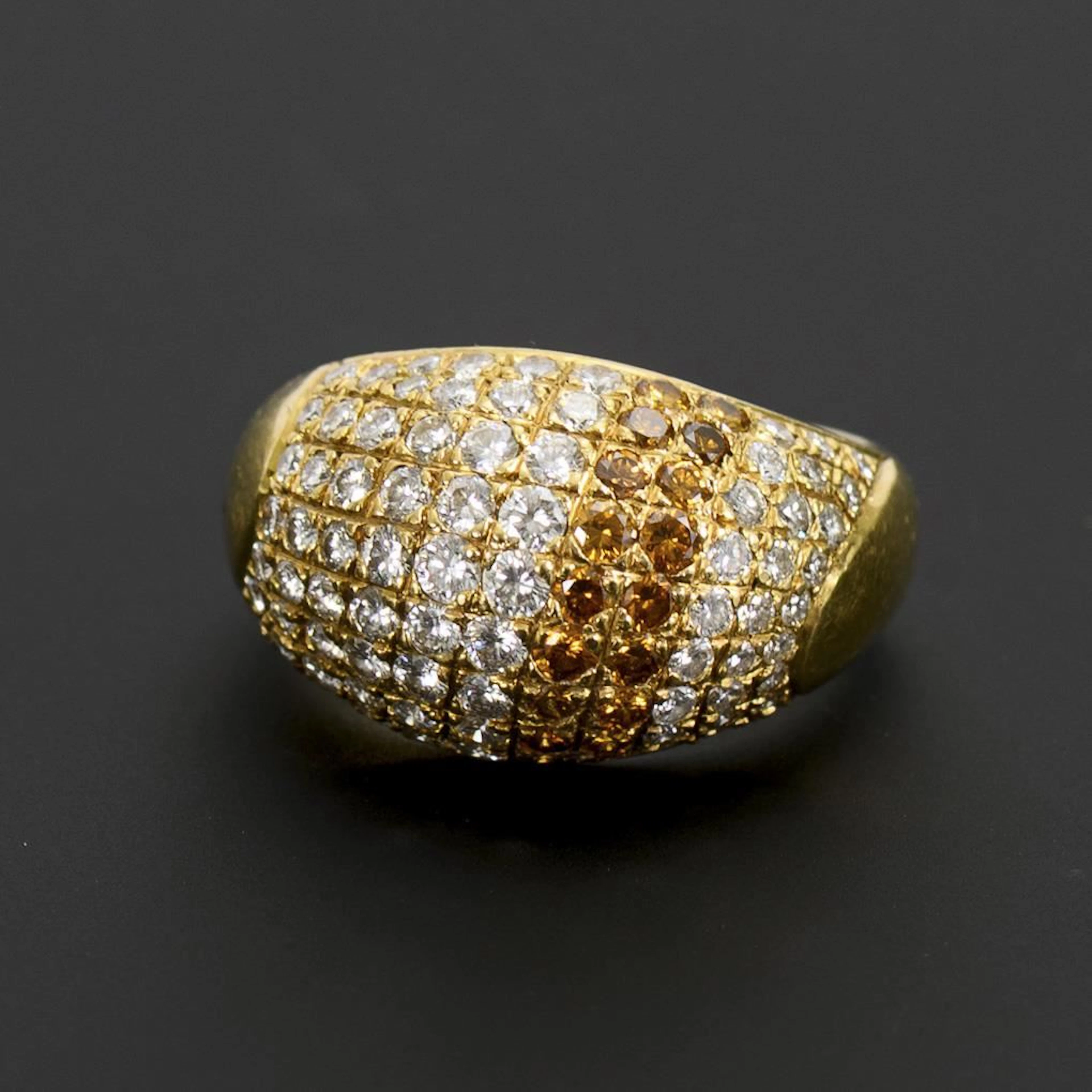 Ring with two-tone diamond setting.