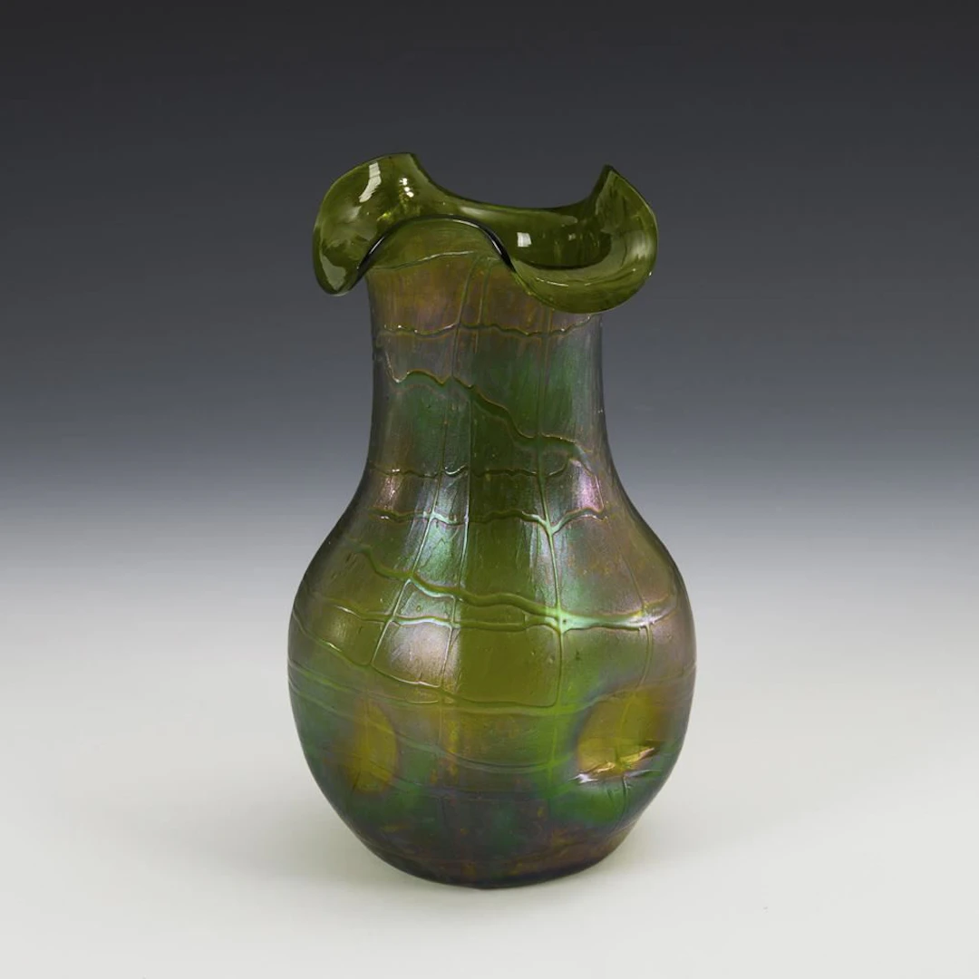 Art Nouveau vase with crumbs and thread net. Kralik.