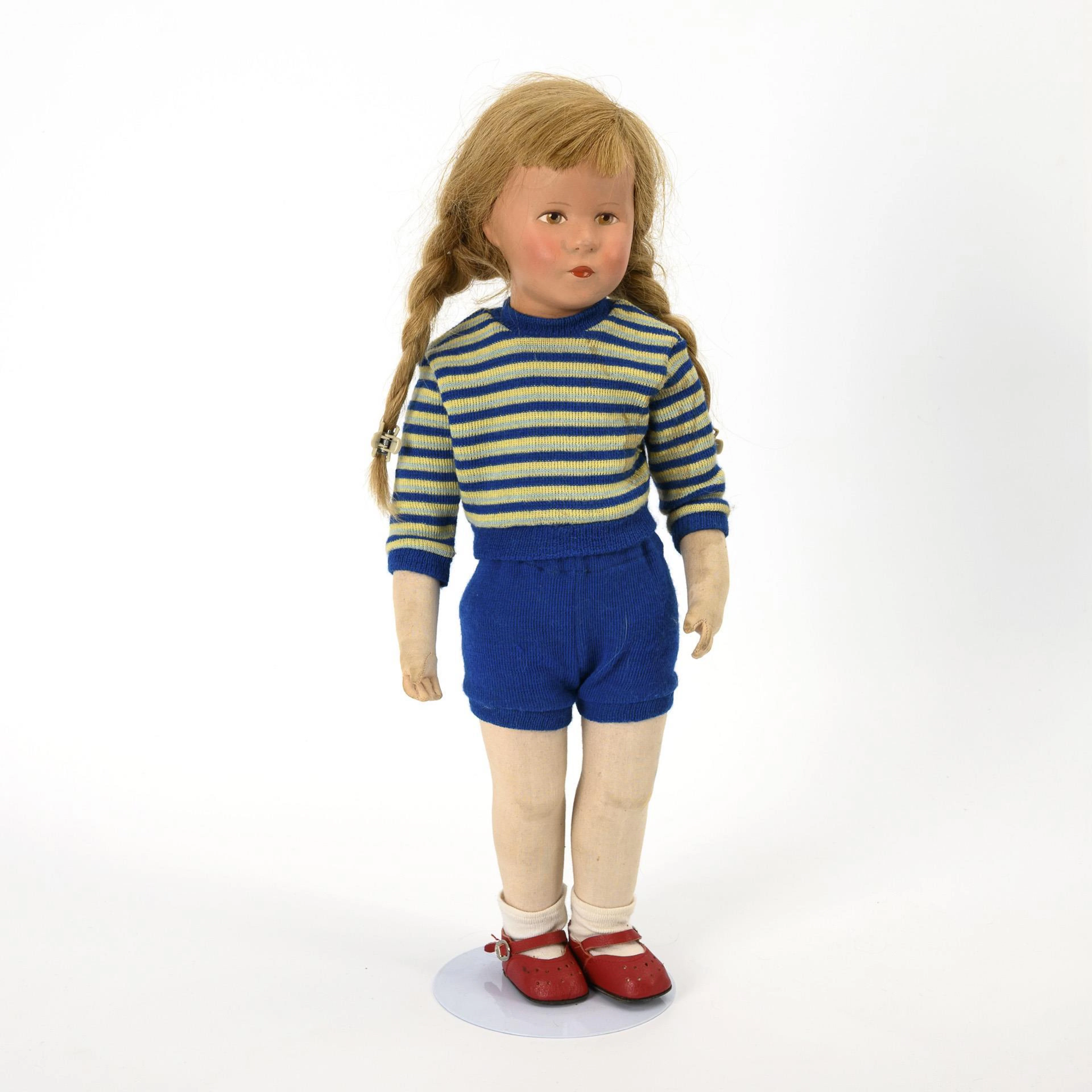 Blonde doll with striped sweater. Käthe Kruse.