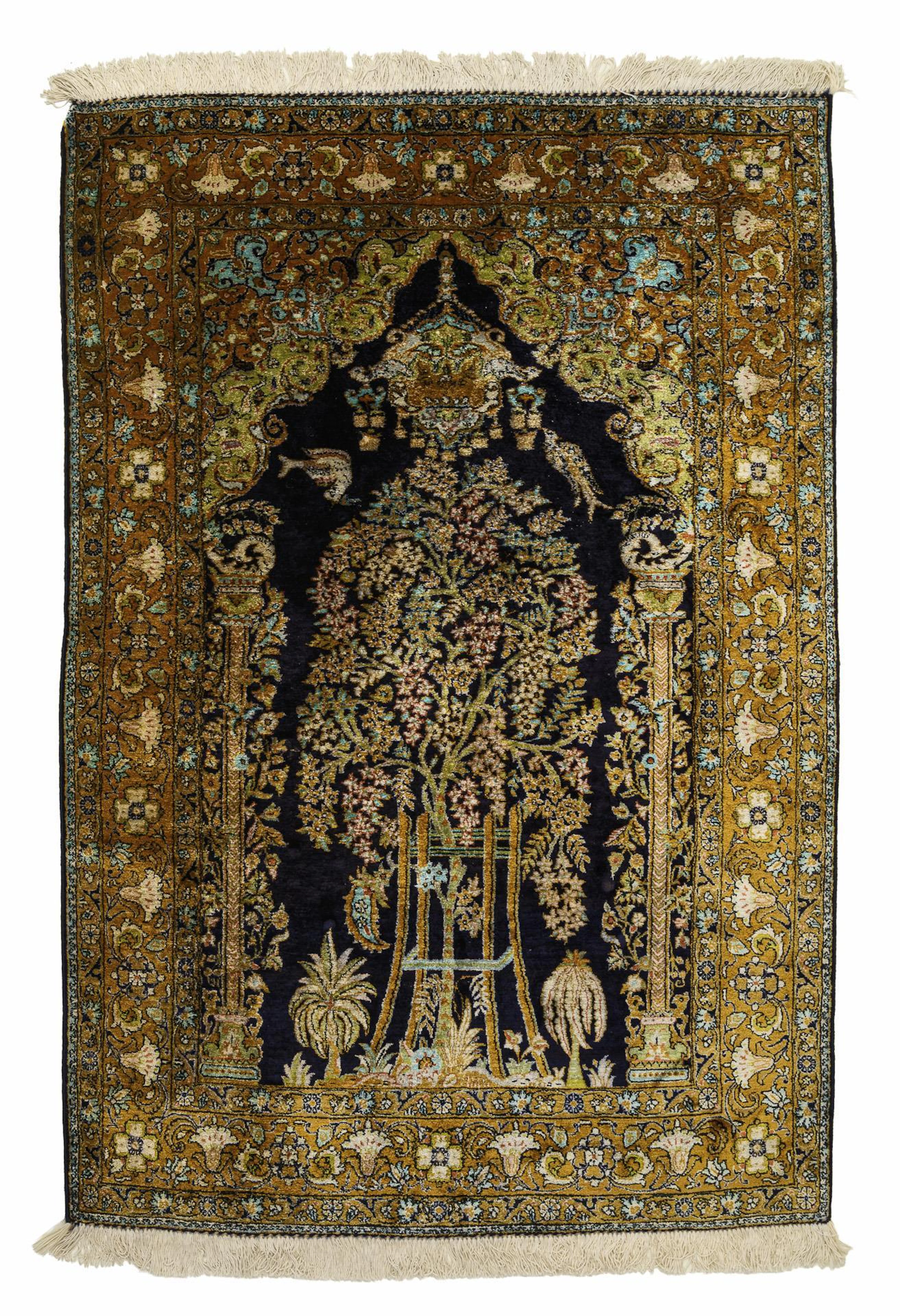 Silk prayer rug with tree of life and animals.