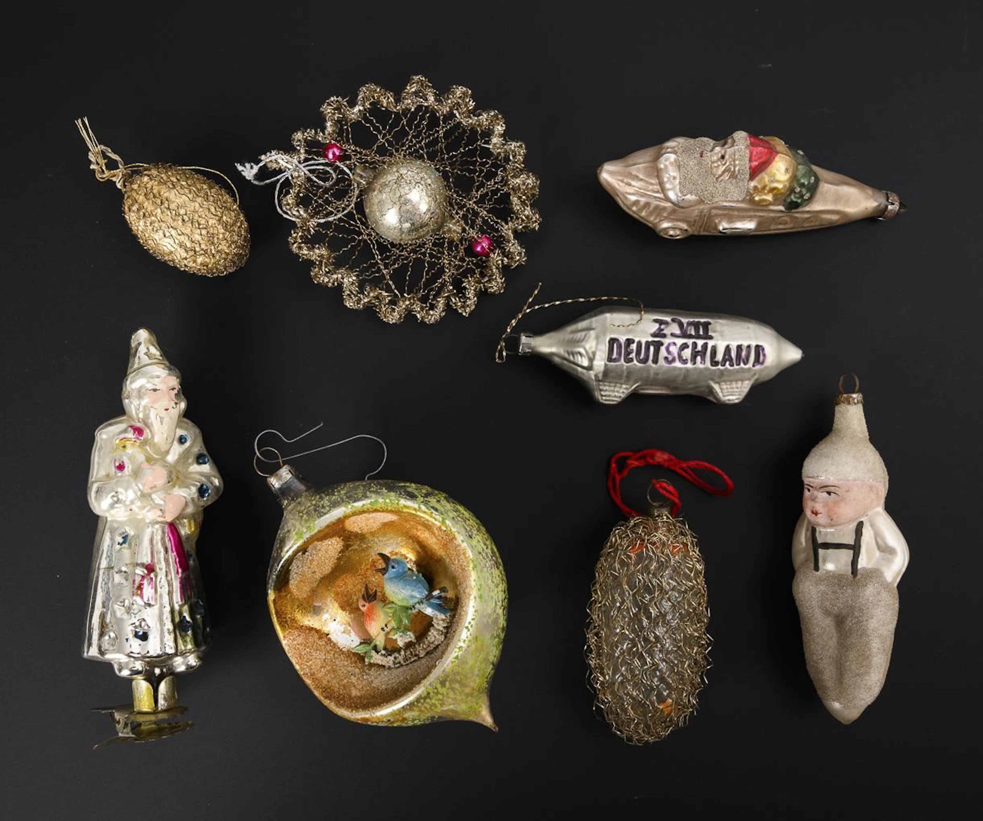 Set of 8 Christmas tree ornaments.