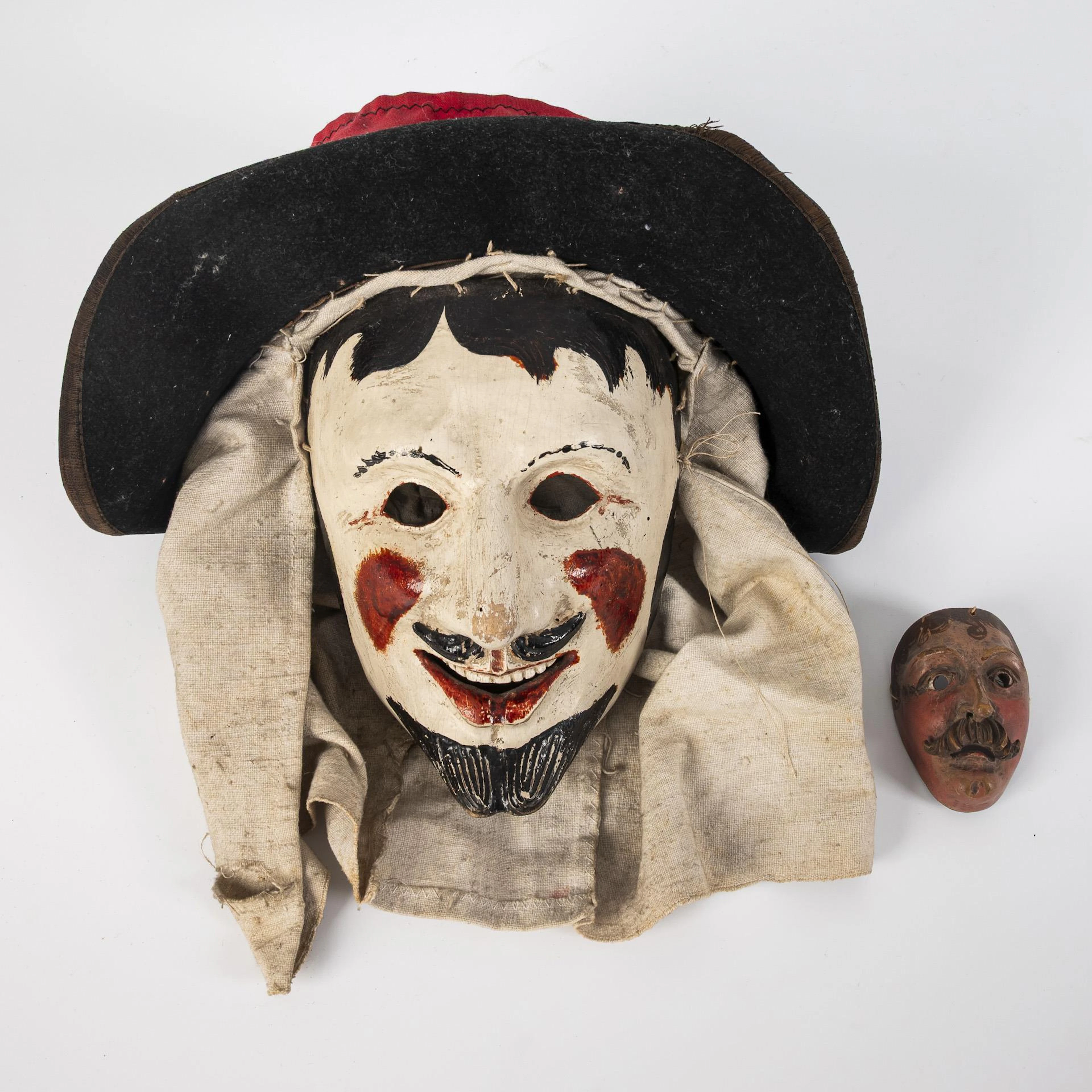2 very high quality carved carnival masks.