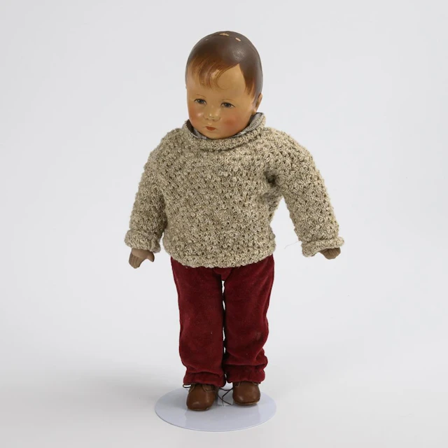 Boy doll with wine-red pants. Käthe Kruse.