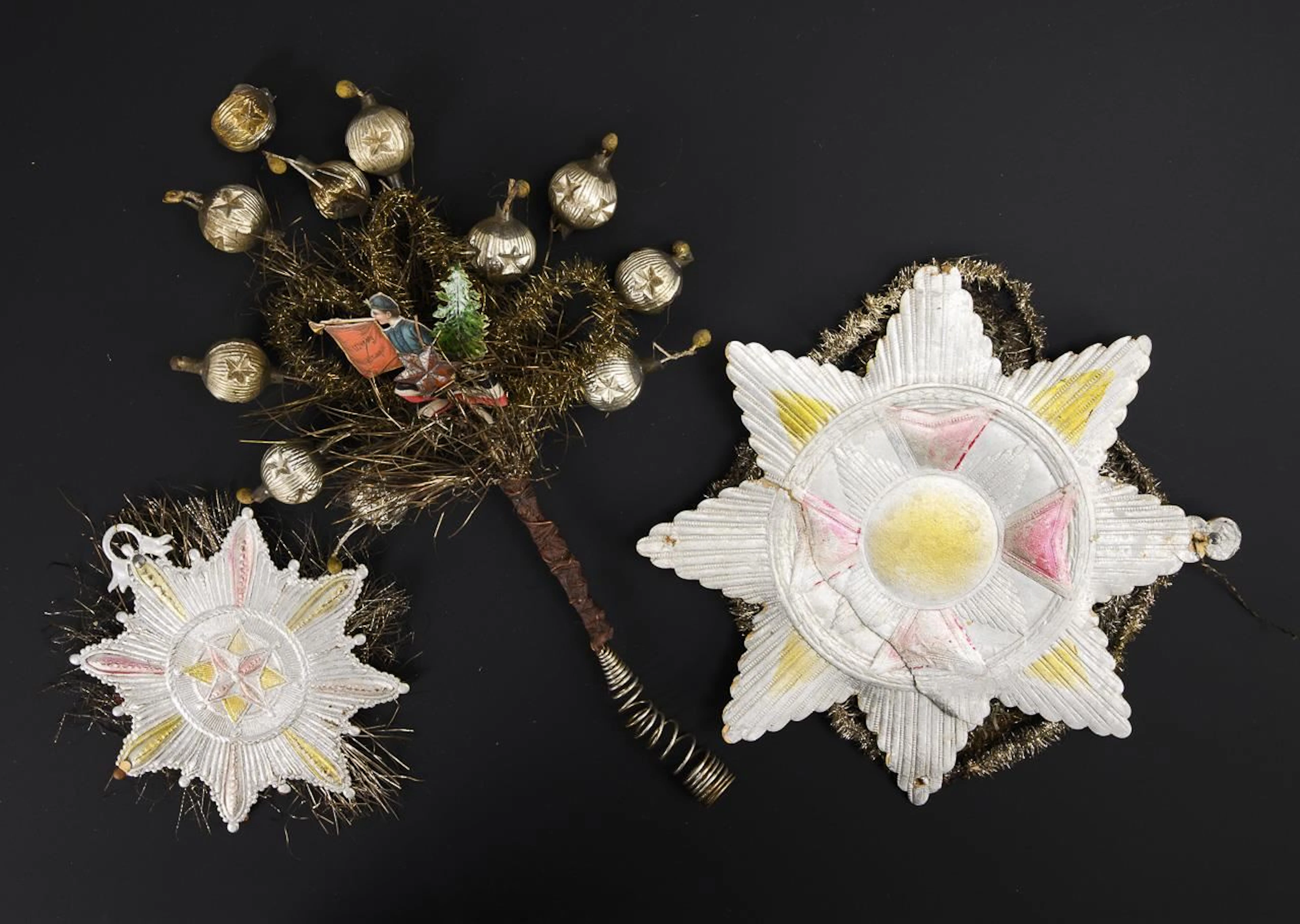 Christmas tree topper and 2 large cotillion medals.