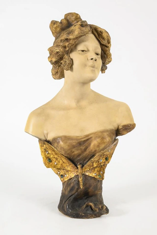 Art Nouveau bust of a girl with a dragonfly. Vienna-based manufacturer