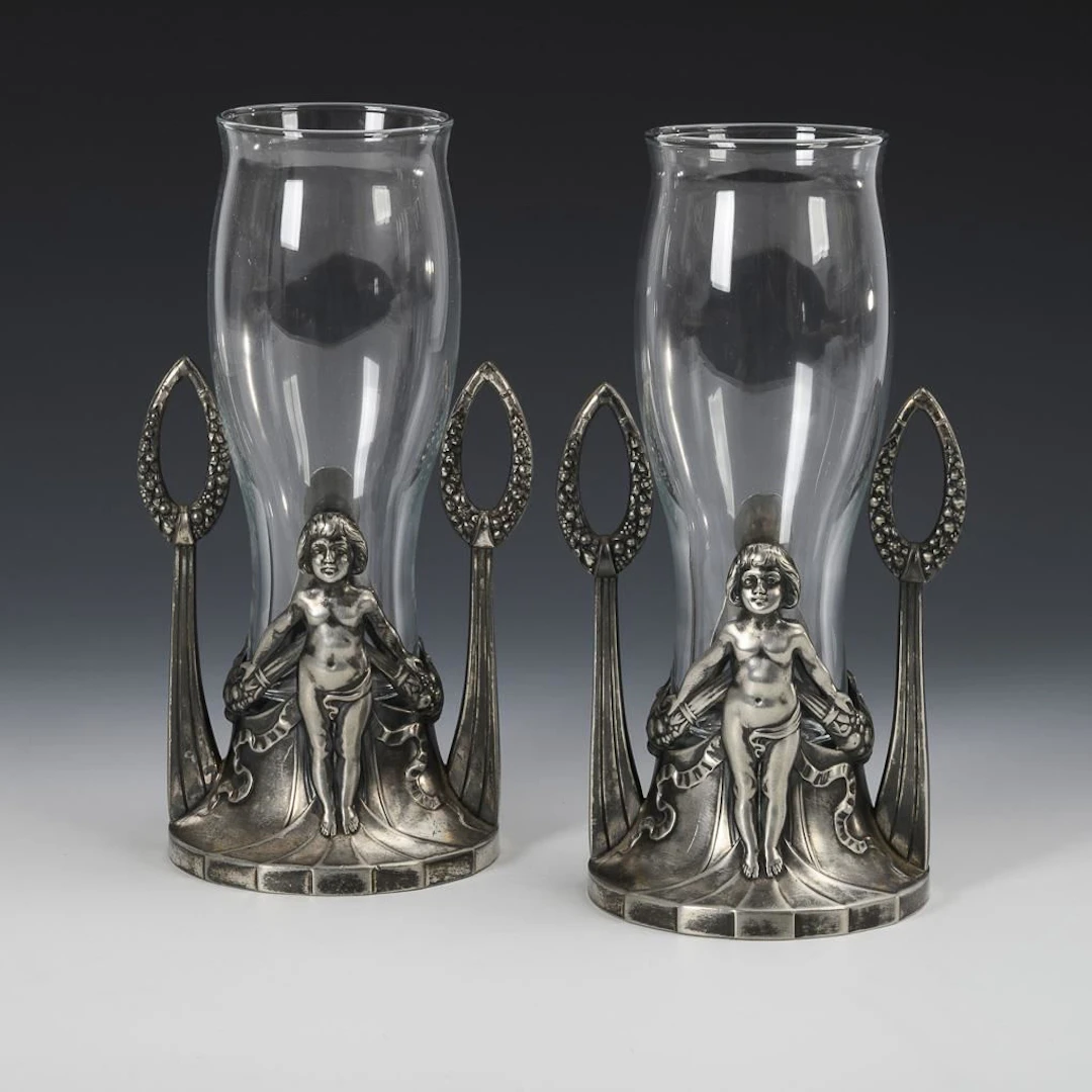 Pair of figurative Art Nouveau vases. WMF.