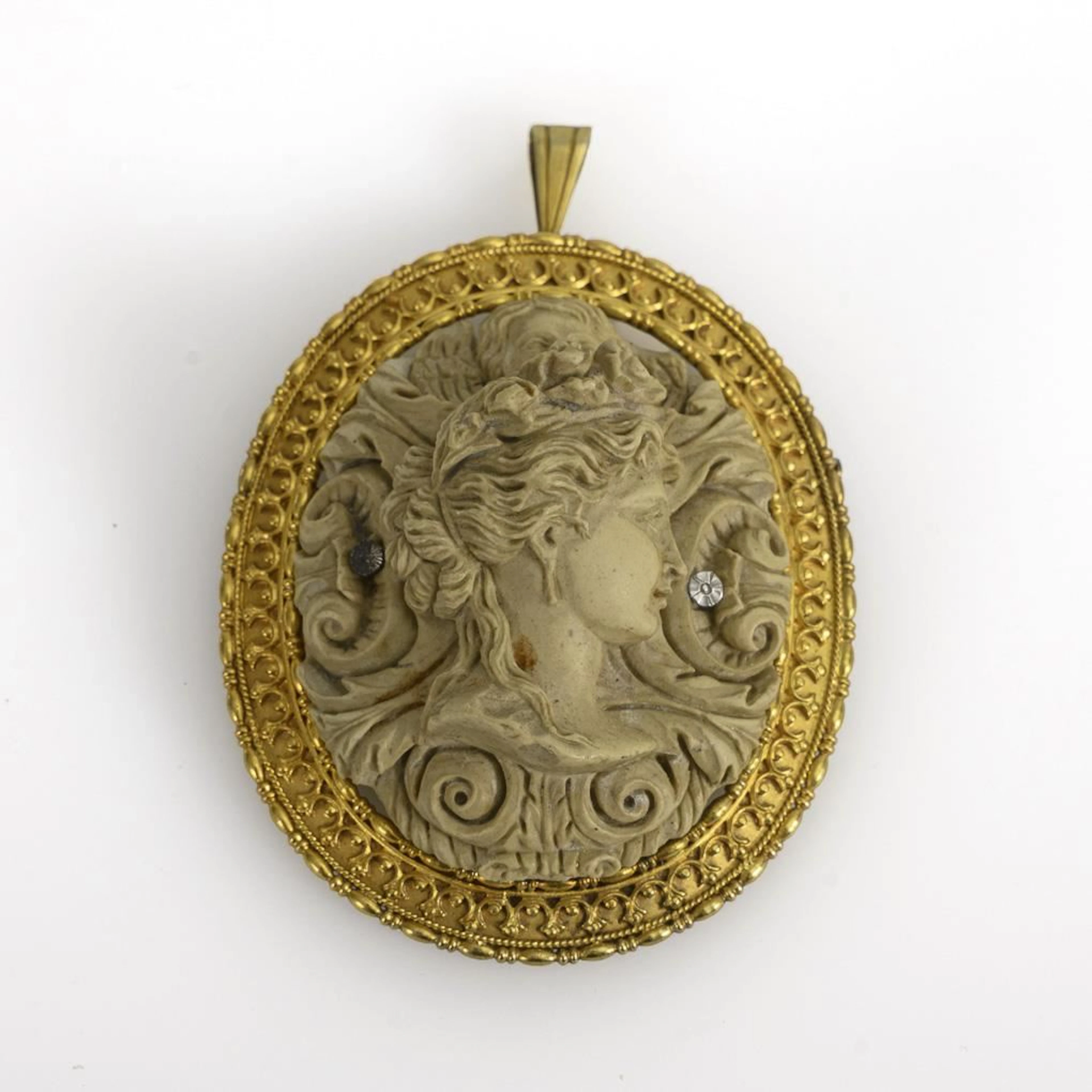 Historic lava stone cameo pendant.