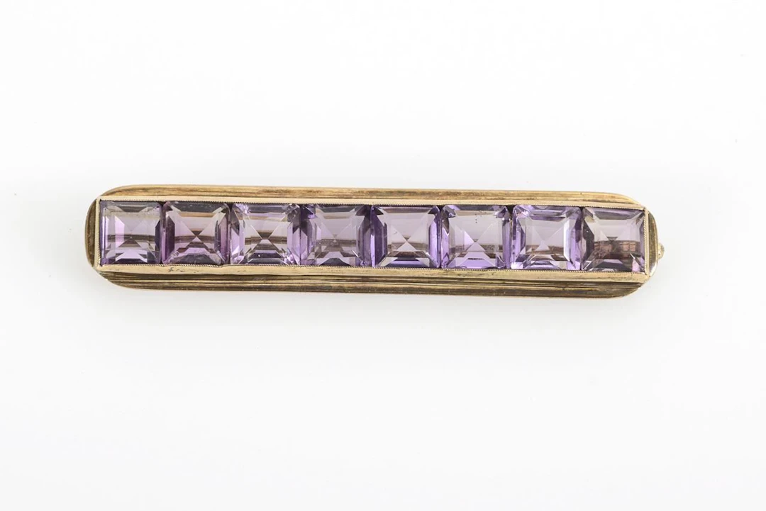 Brooch with square amethysts.