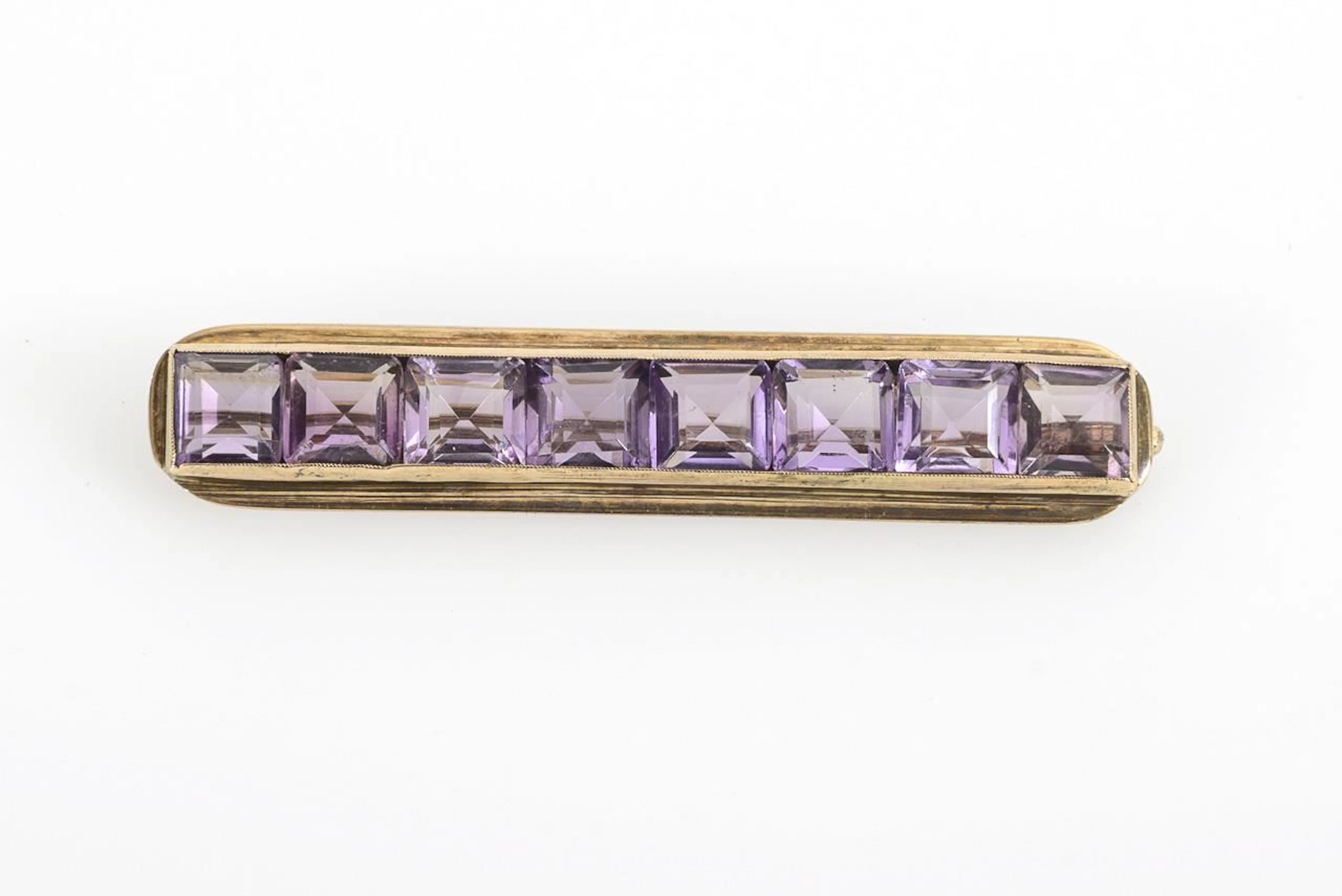 Brooch with square amethysts.