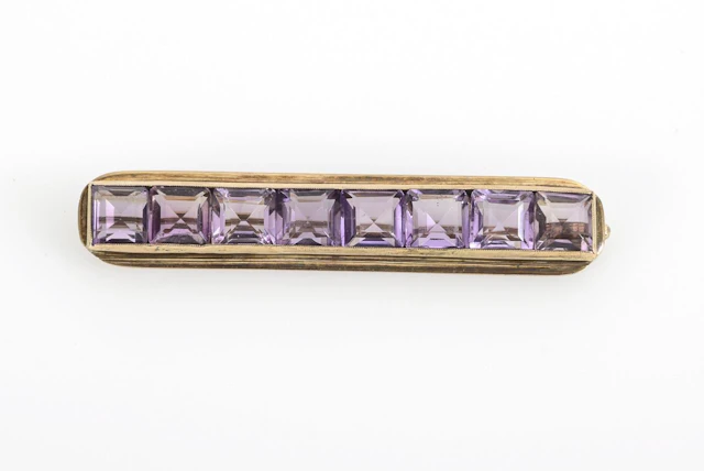 Brooch with square amethysts.