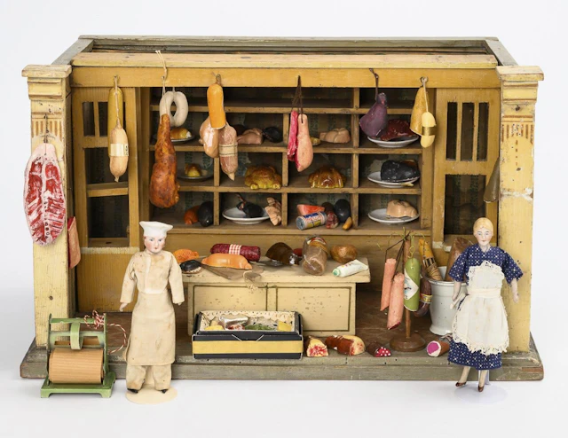 Small butcher shop with 2 salespeople.