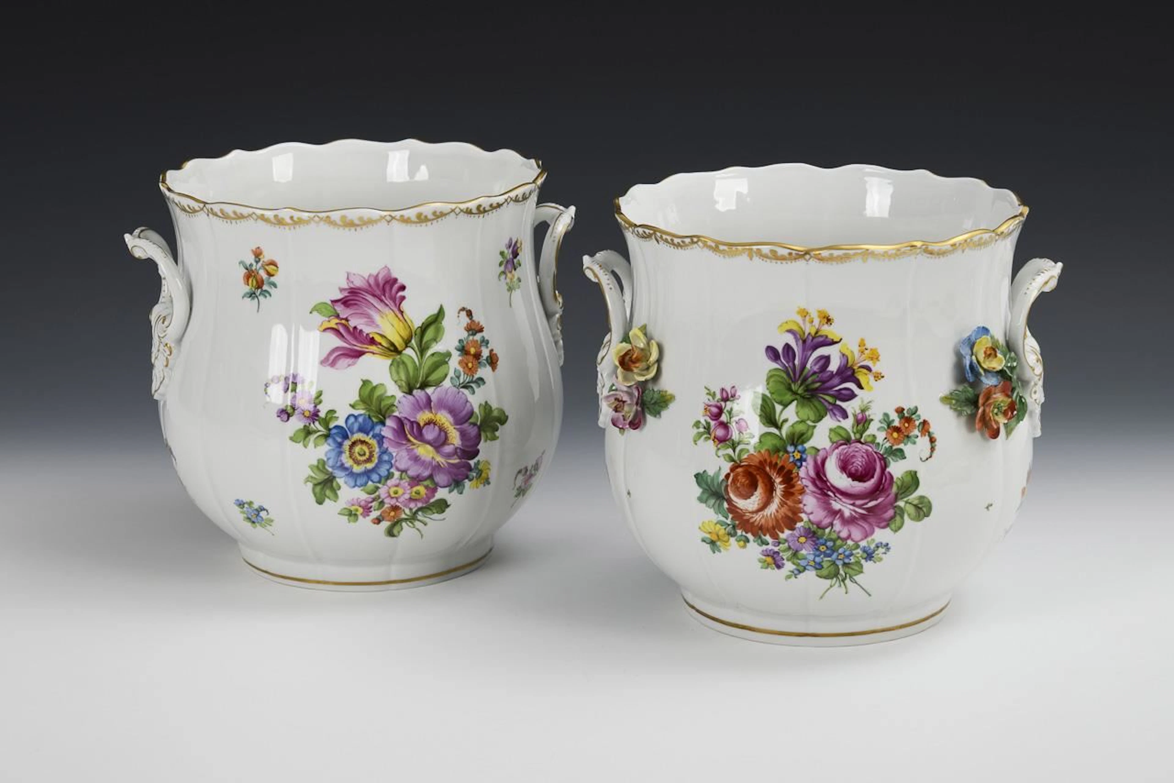 2 large cachepots with floral designs. Potschappel.