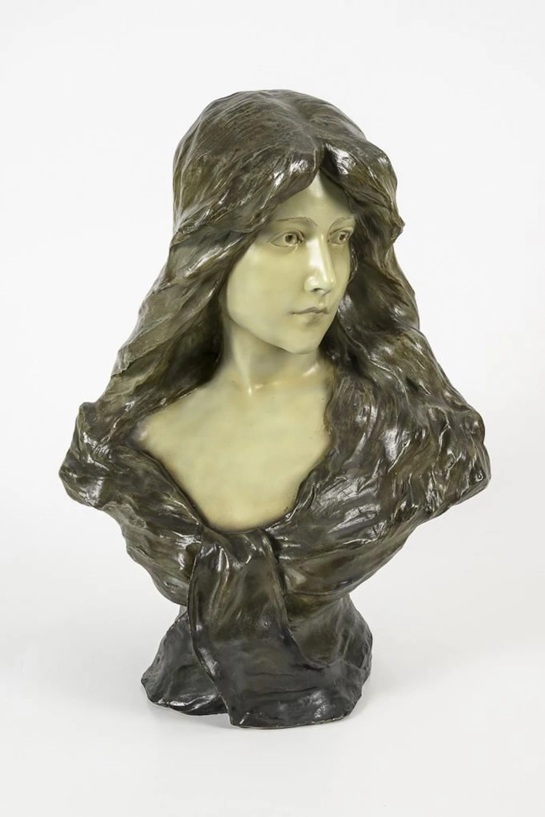 Art Nouveau bust of a woman.