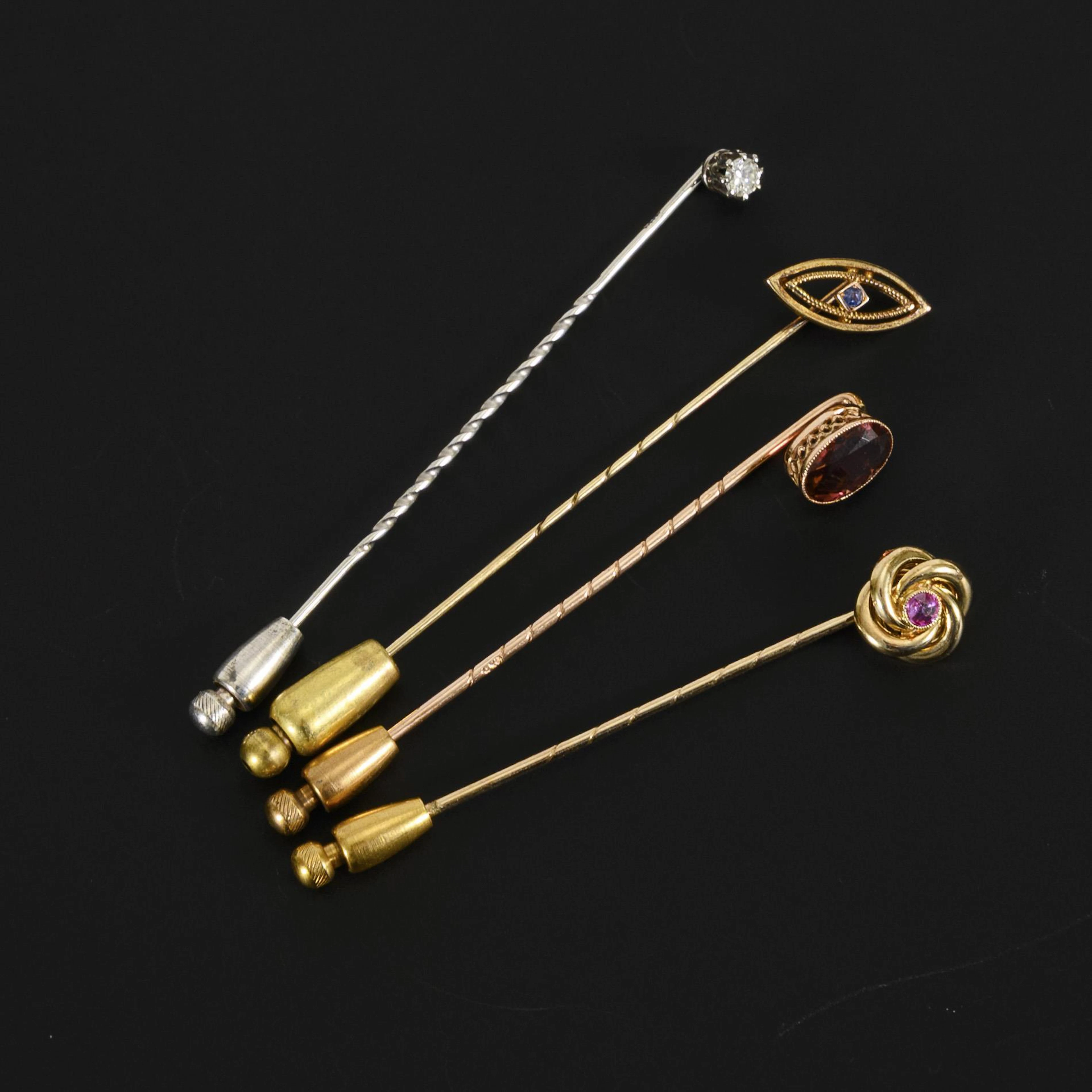 4 Art Nouveau pins.