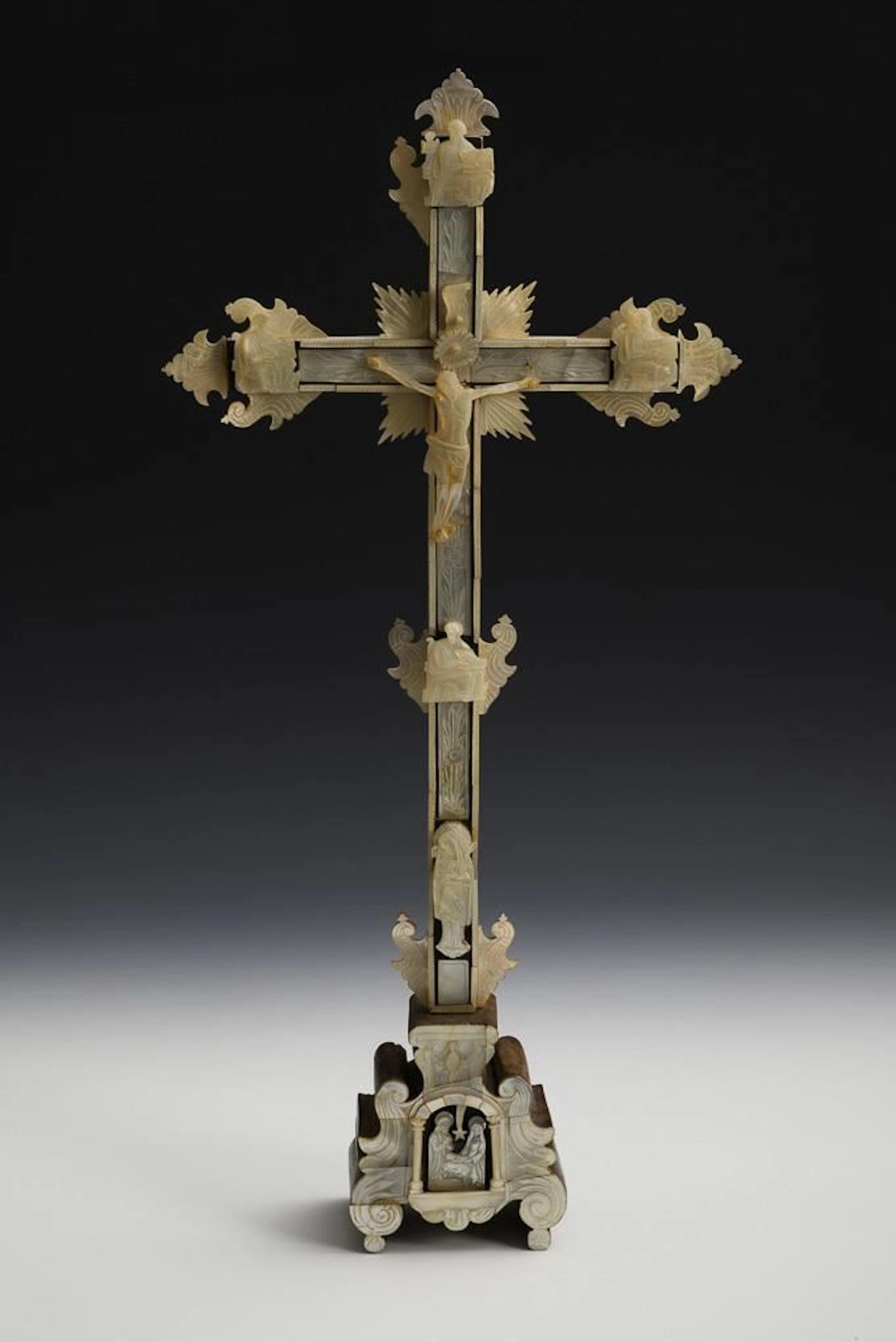 Crucifix with mother-of-pearl inlays and reliefs.