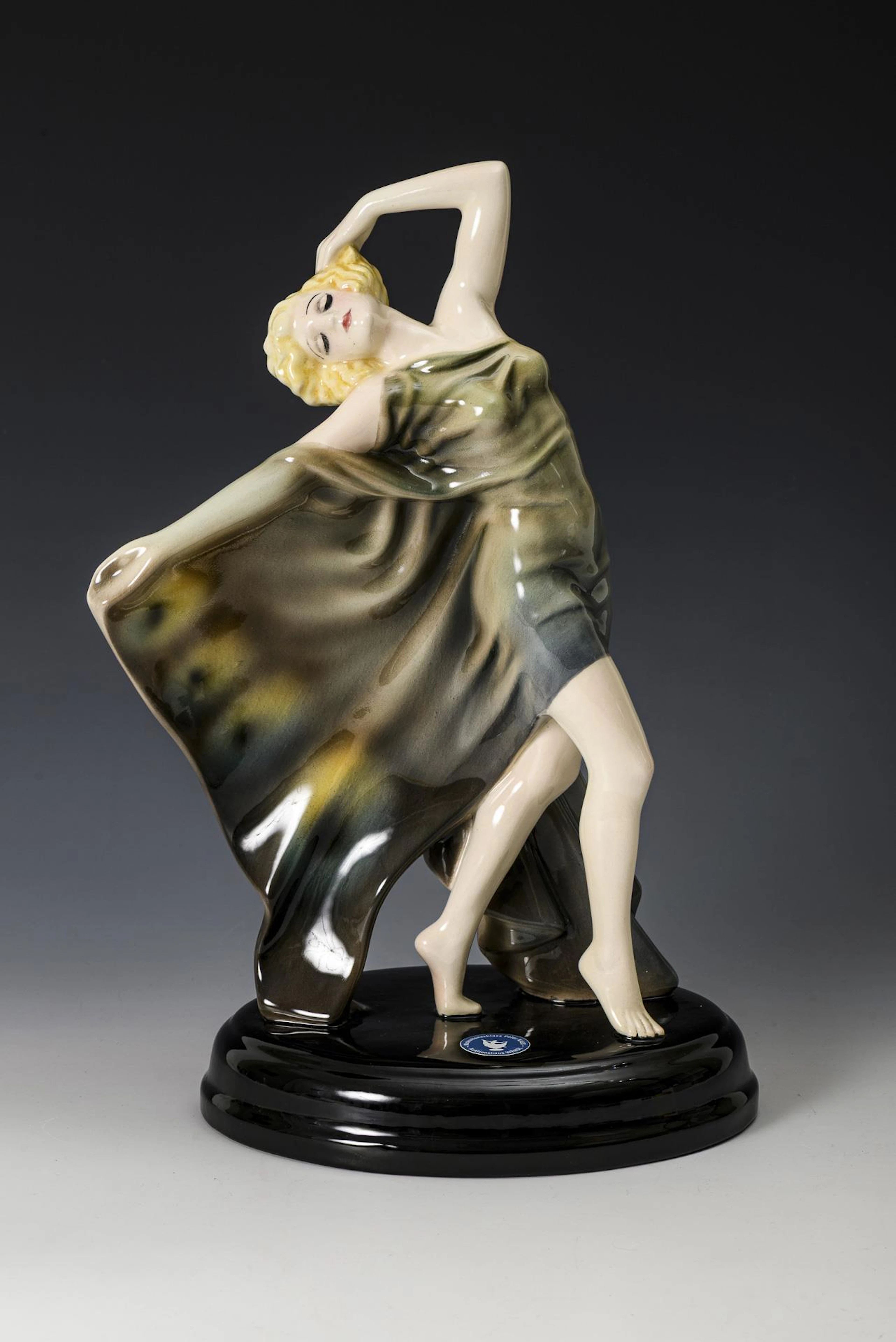 Art deco dancer in a green butterfly dress. Keramos, Viennese art ceramics.