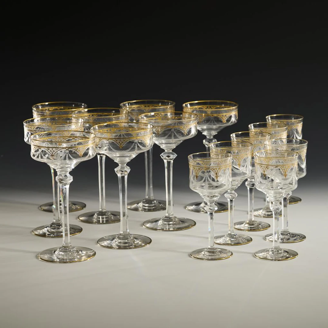 8 champagne glasses and 7 red wine glasses.