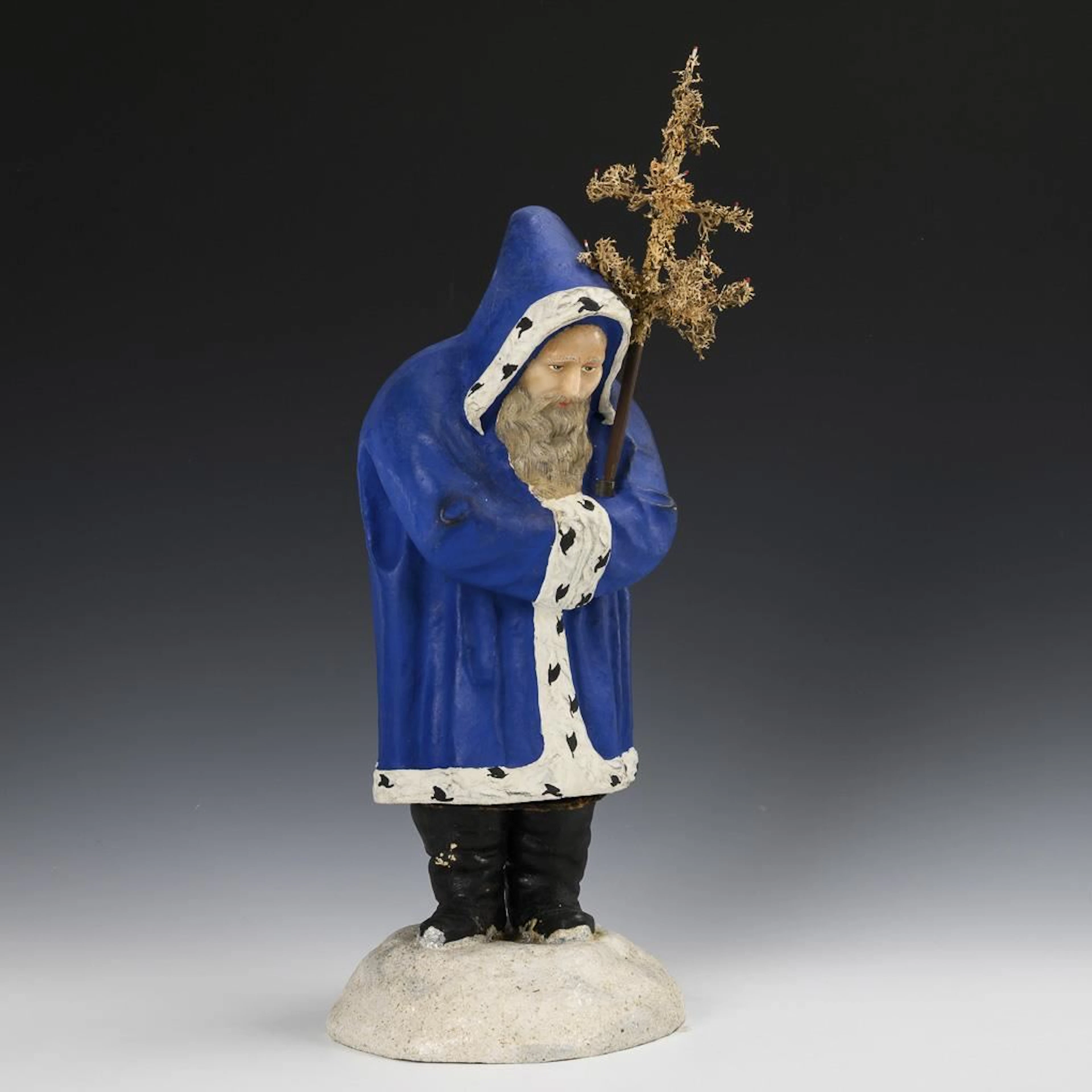 Santa Claus with a wax face.