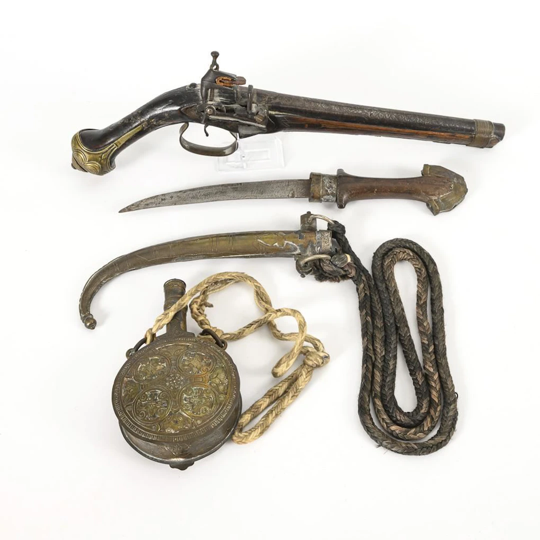 Pistol, powder flask, dagger - North Africa.