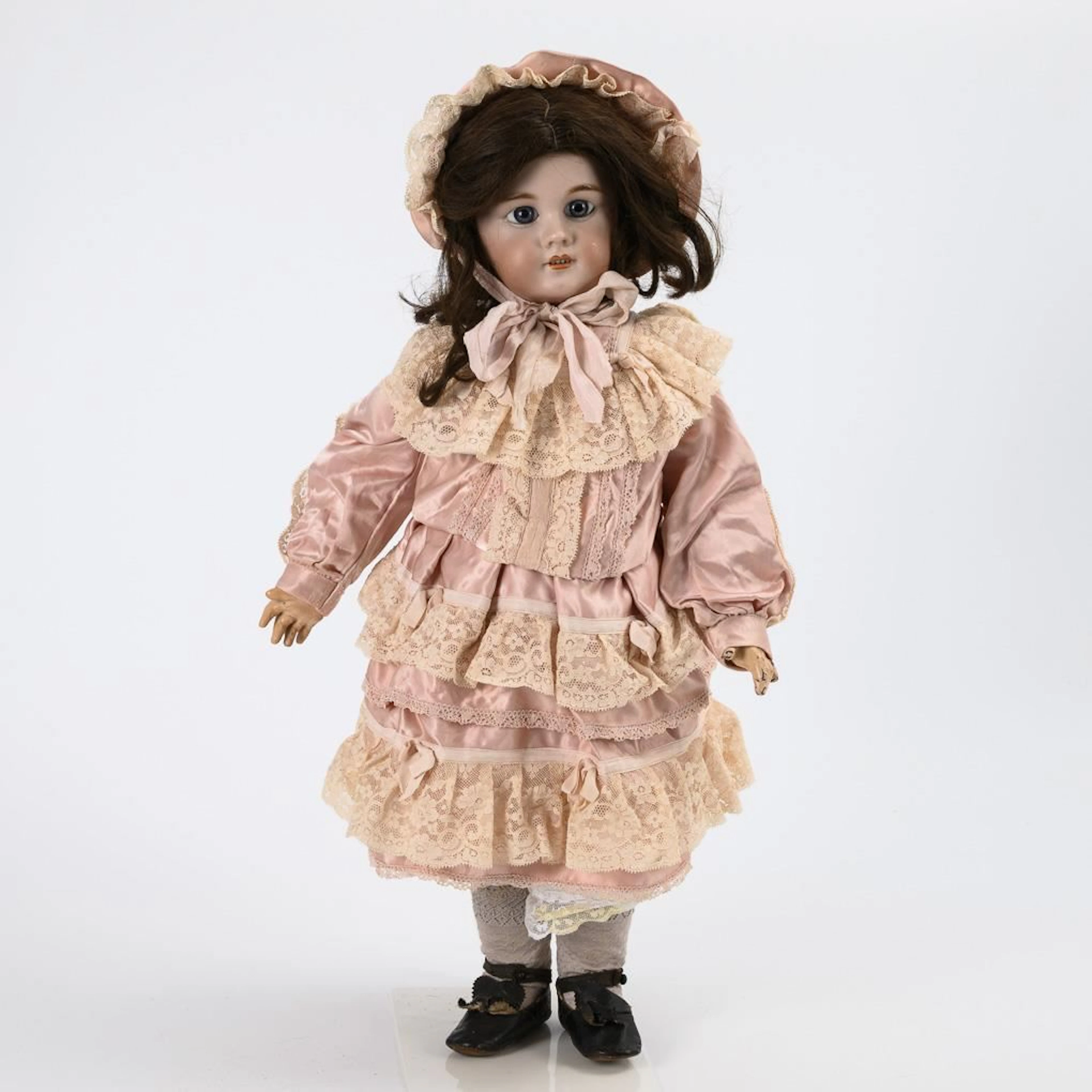 French doll in a pink dress. Jumeau.