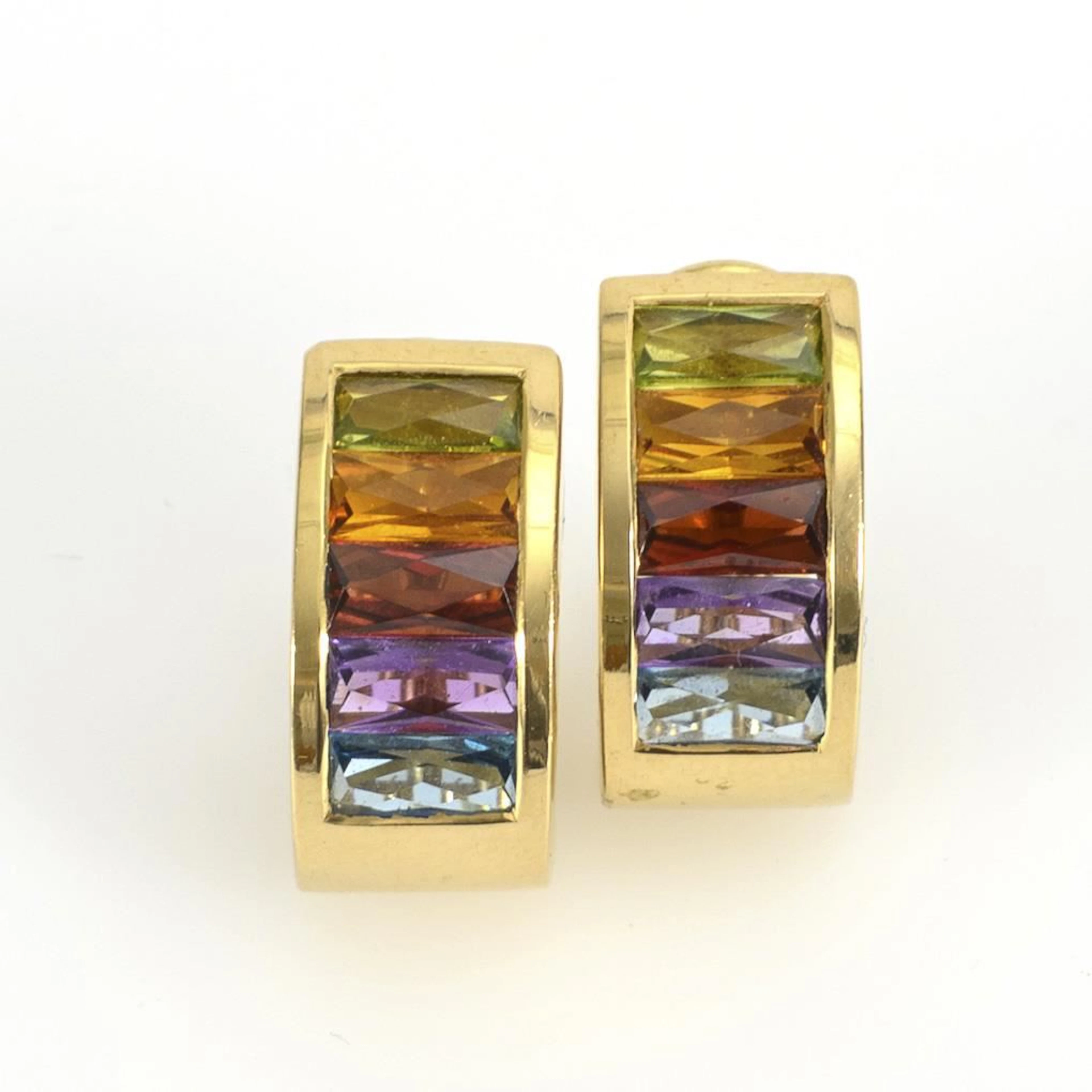 Clip-on earrings with multicolored gemstone accents.