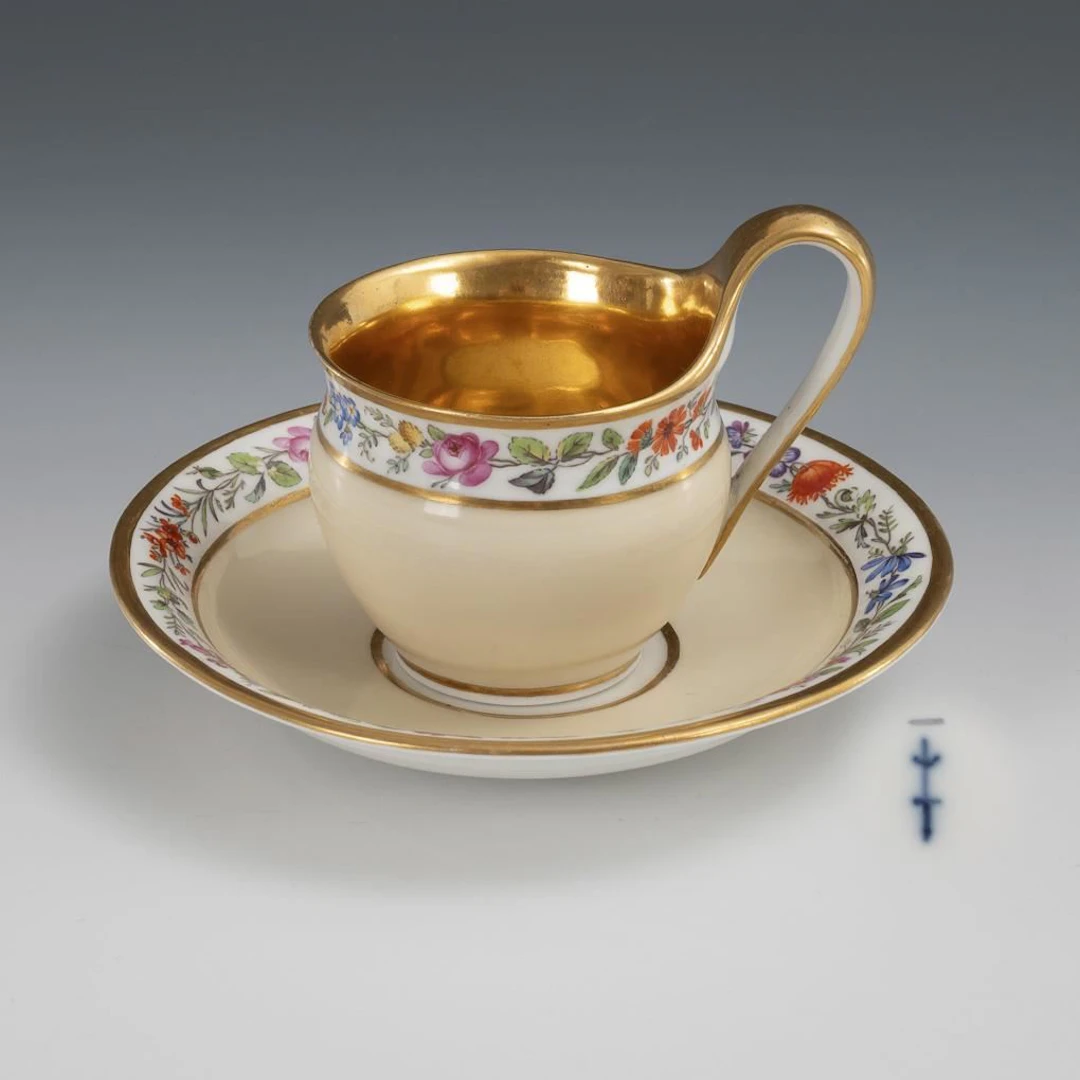 Display cup with floral border. KPM Berlin.