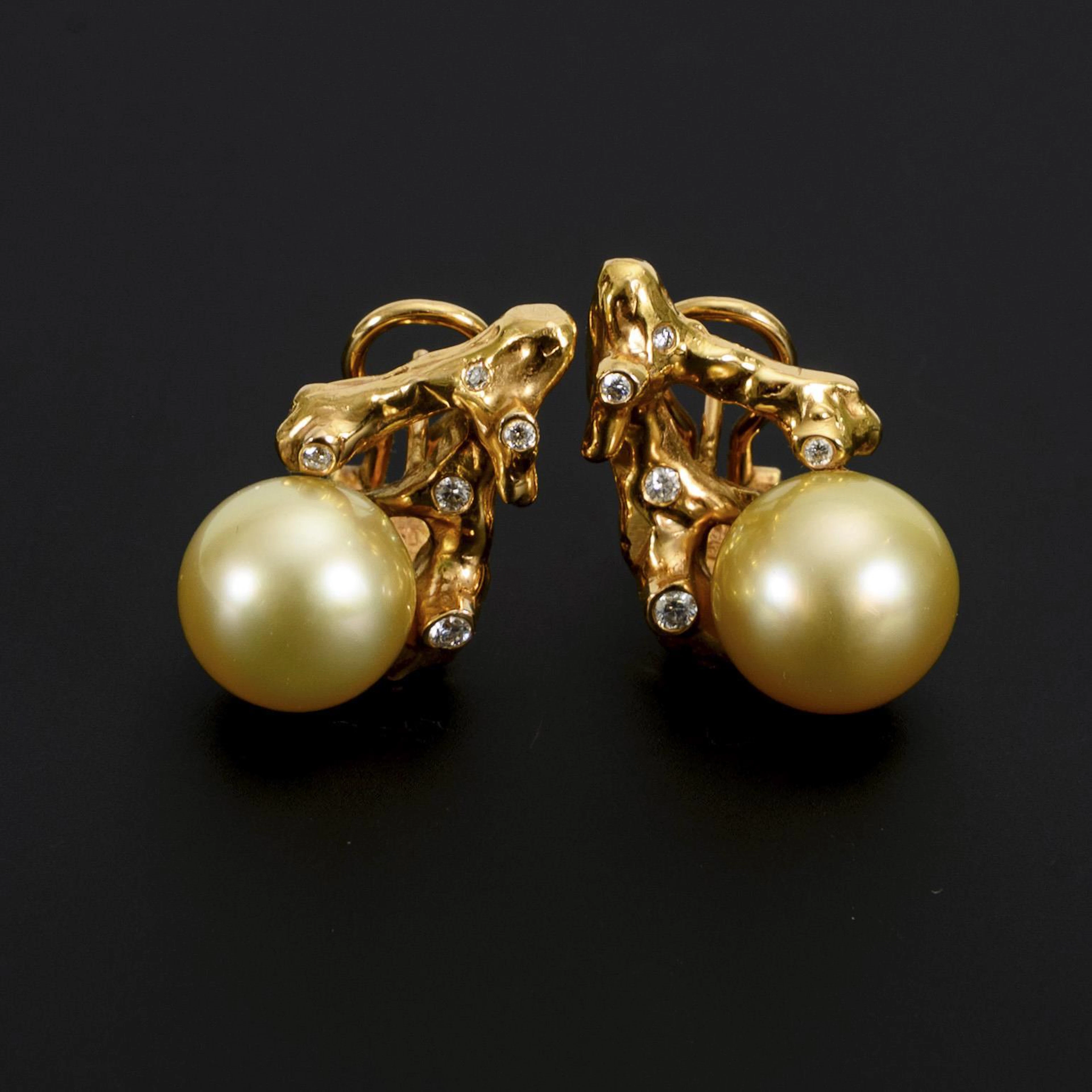 Coral-shaped clip studs with pearls.