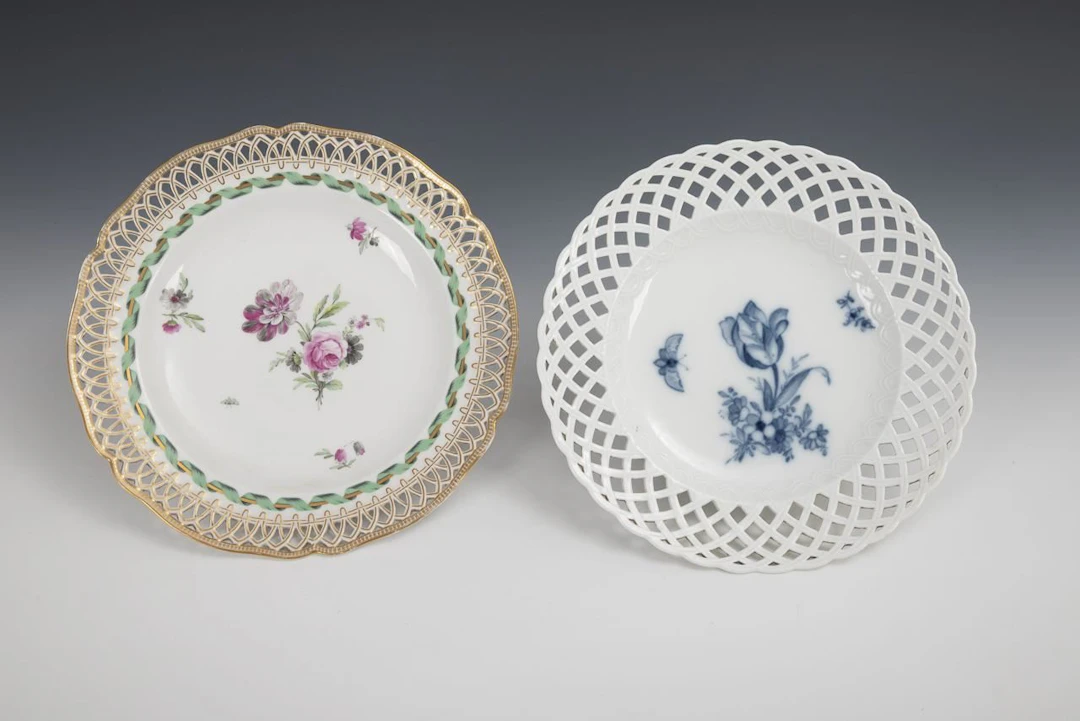 2 openwork plates with floral designs. KPM Berlin.