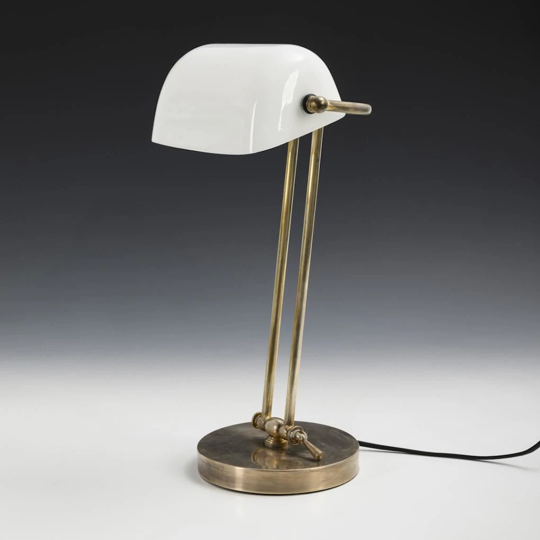 Art Deco desk lamp with white shade.