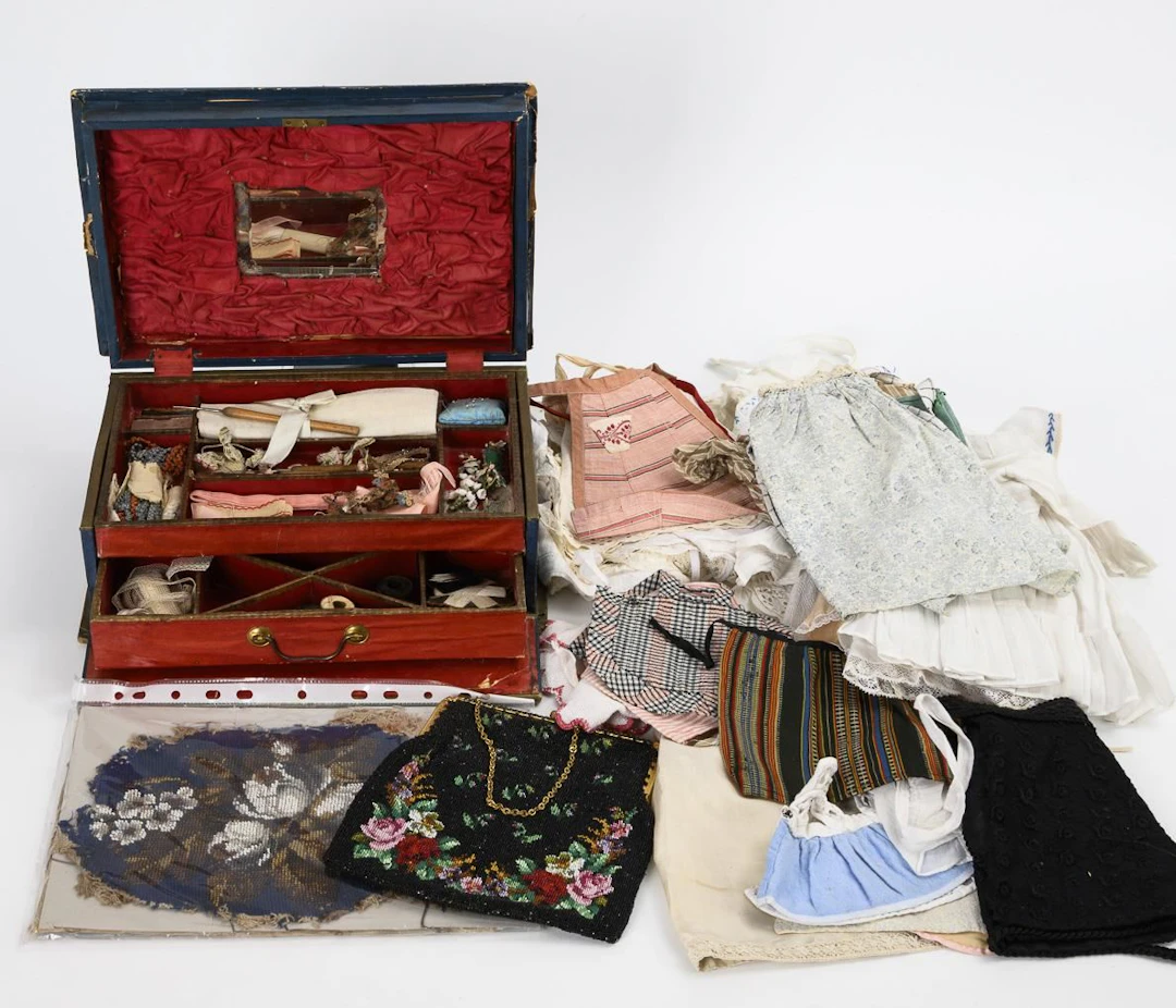 French sewing box "Modes de Paris" and set of dresses.