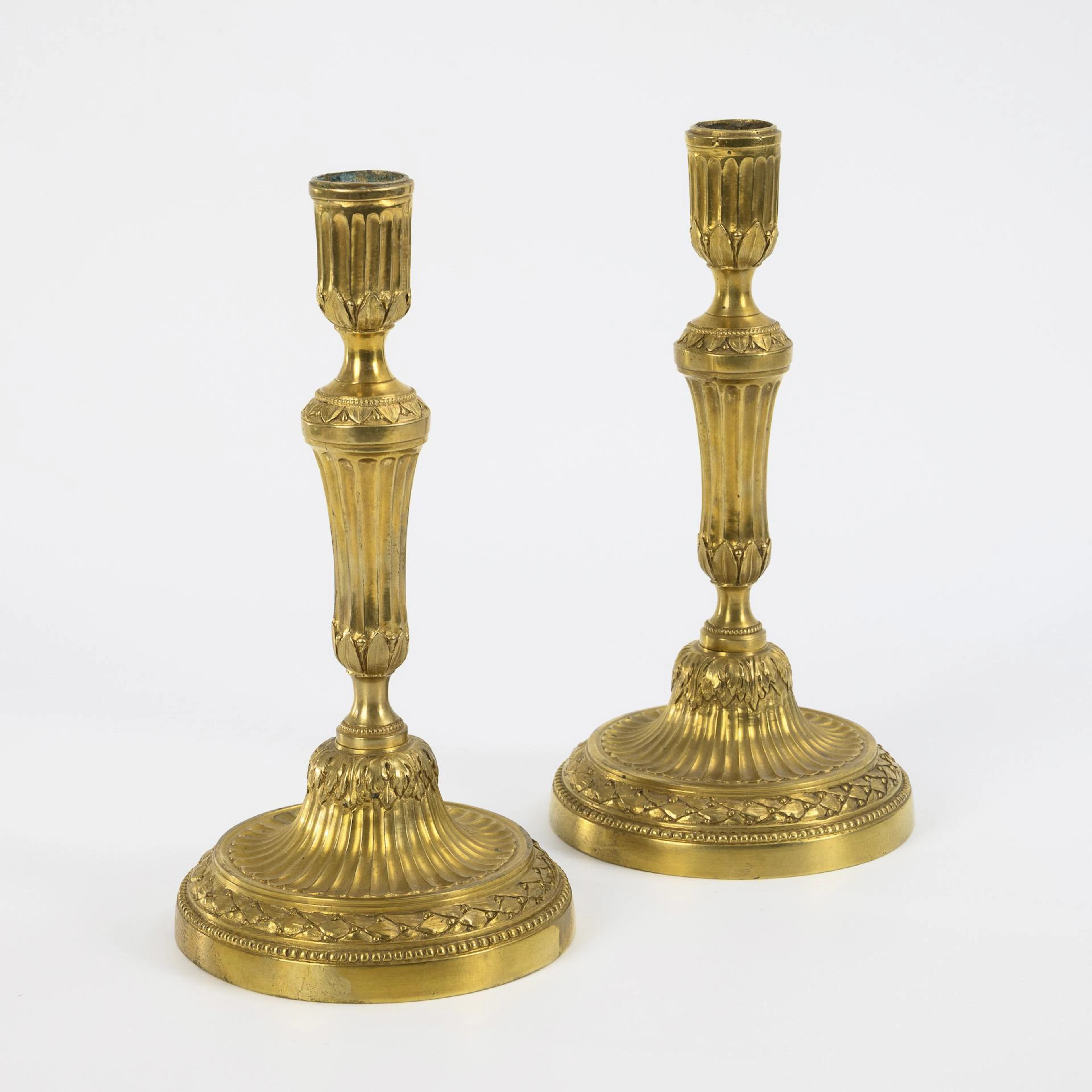 Pair of French Louis-seize candlesticks.