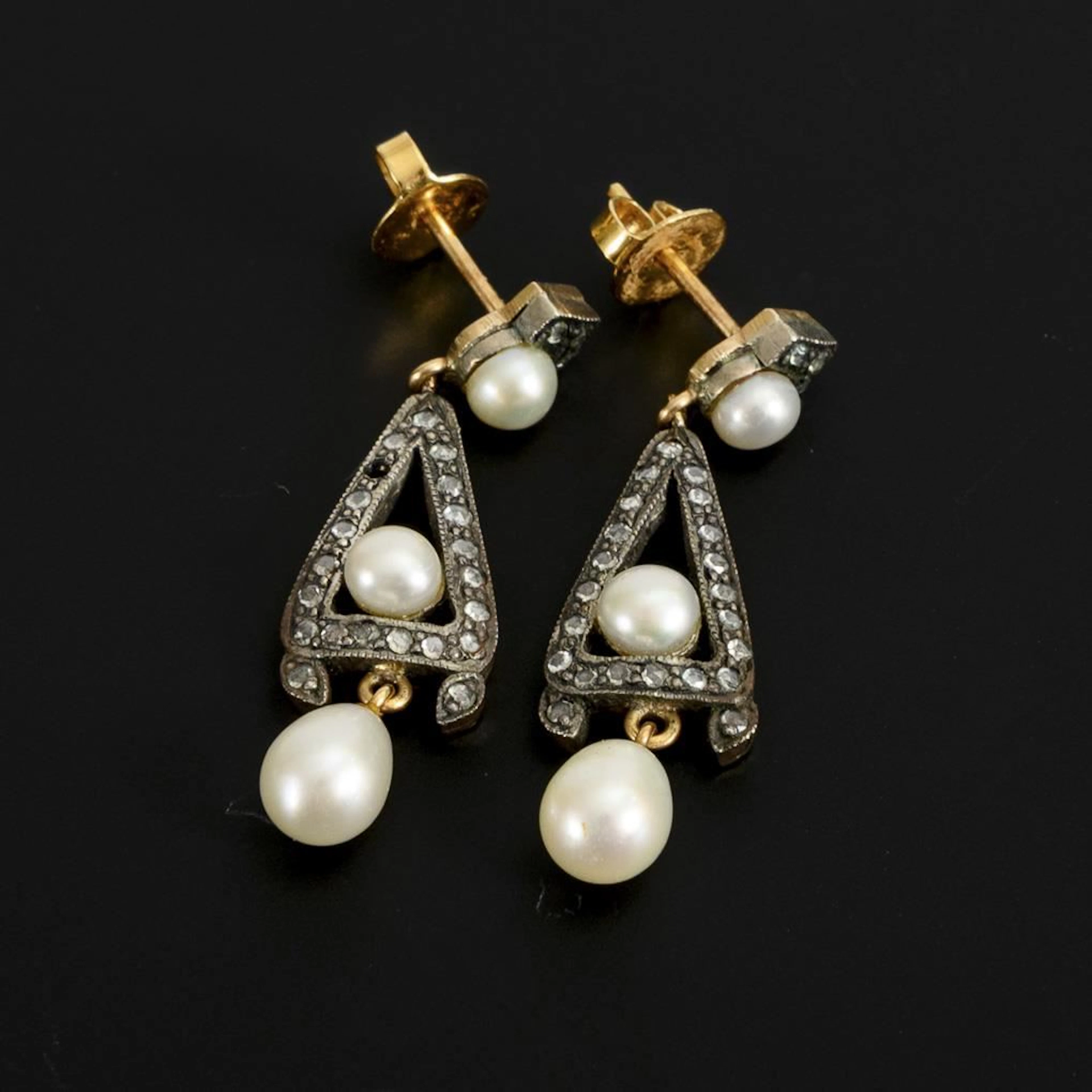 Art Deco-style dangling earrings.